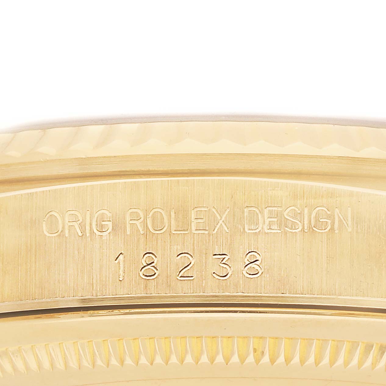 The image shows a close-up of the engraved case back of the Rolex President 18238 Men's Yellow Gold Champagne Dial model, highlighting the model number and "Orig Rolex Design."