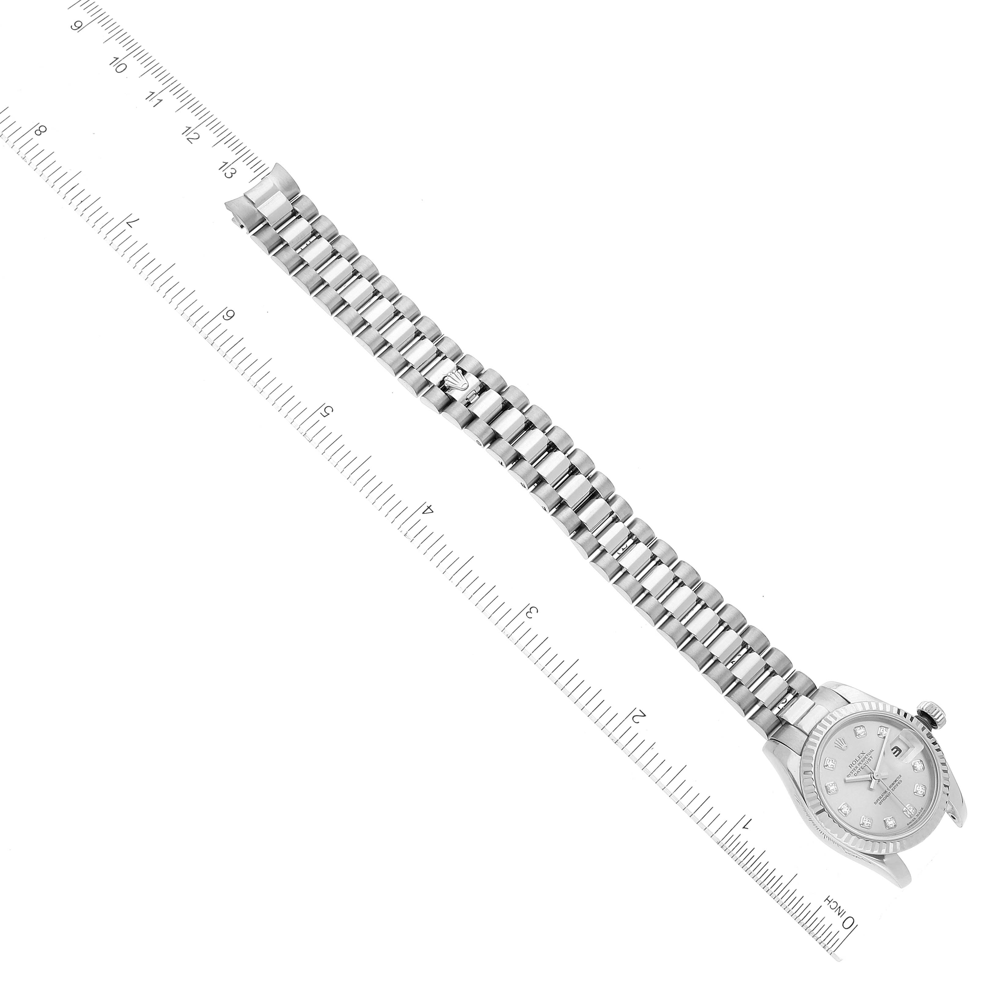 The image shows the entire length of a Rolex President 179179 Women's White Gold Silver Dial 179179 Women's White Gold Silver Dial watch, including its bracelet and face, from a top-down angle.