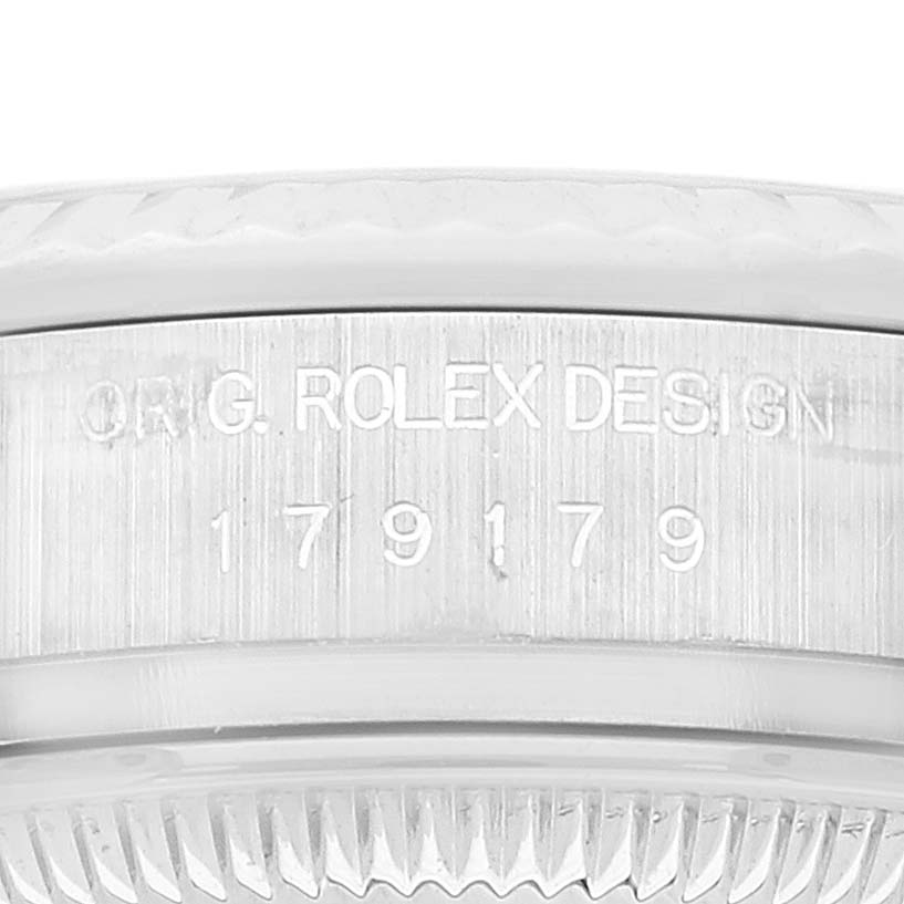 This image shows a close-up of the side engraving on a Rolex President 179179 Women's White Gold Silver Dial 179179 Women's White Gold Silver Dial model watch.