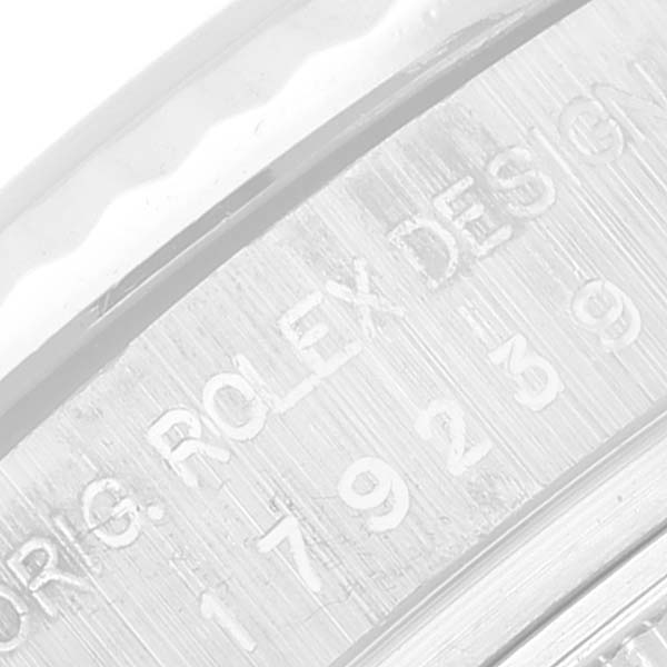 This image shows a close-up of the engraving on the edge of the case back of a Rolex President 179239 Women's White Gold White Dial 179239 Women's White Gold White Dial model watch.