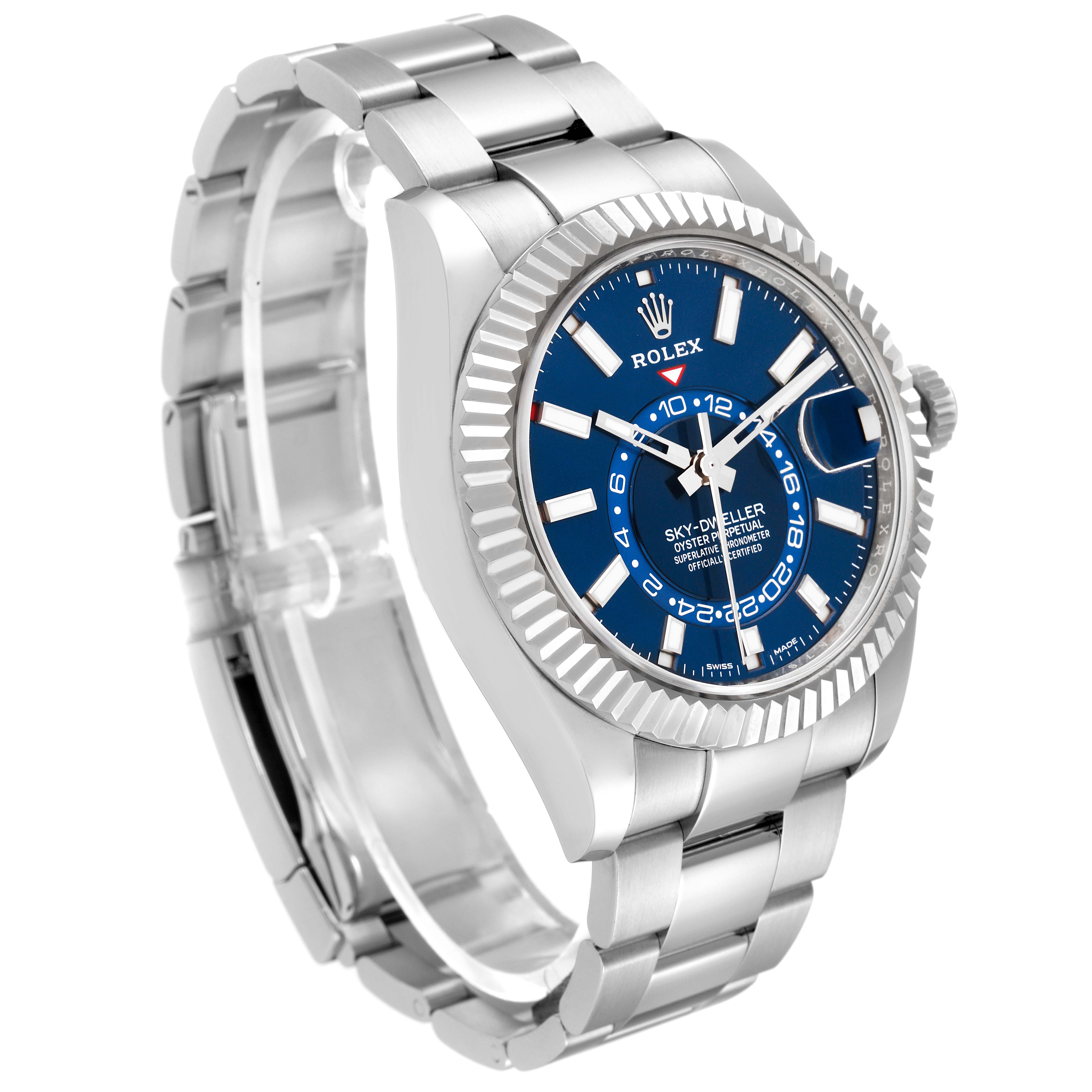 The image shows a Rolex Sky-Dweller 326934 Men's Stainless Steel Blue Dial 326934 Men's Stainless Steel Blue Dial watch at a three-quarter angle, highlighting its blue dial, fluted bezel, and stainless steel bracelet.