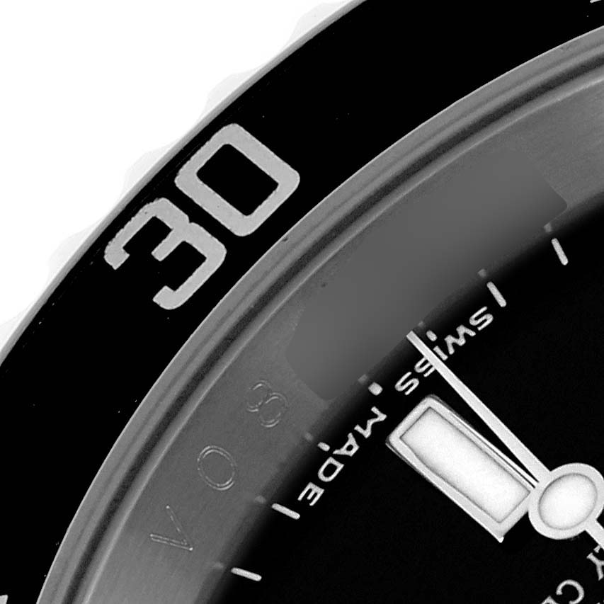 The image shows a close-up of the bezel and dial of a Rolex Submariner 16610 Men
s Stainless Steel Black Dial 16610 Men
s Stainless Steel Black Dial watch, highlighting the "30" minute marker.
