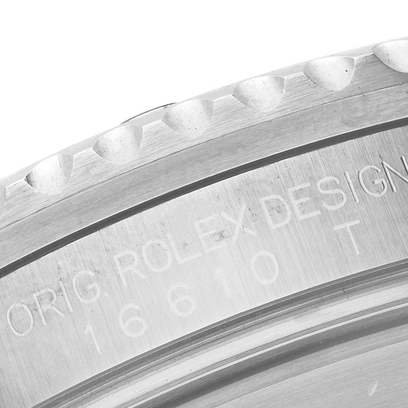 This image shows a close-up of the bezel engraving on a Rolex Submariner 16610 Men
s Stainless Steel Black Dial 16610 Men
s Stainless Steel Black Dial, focusing on the model details.