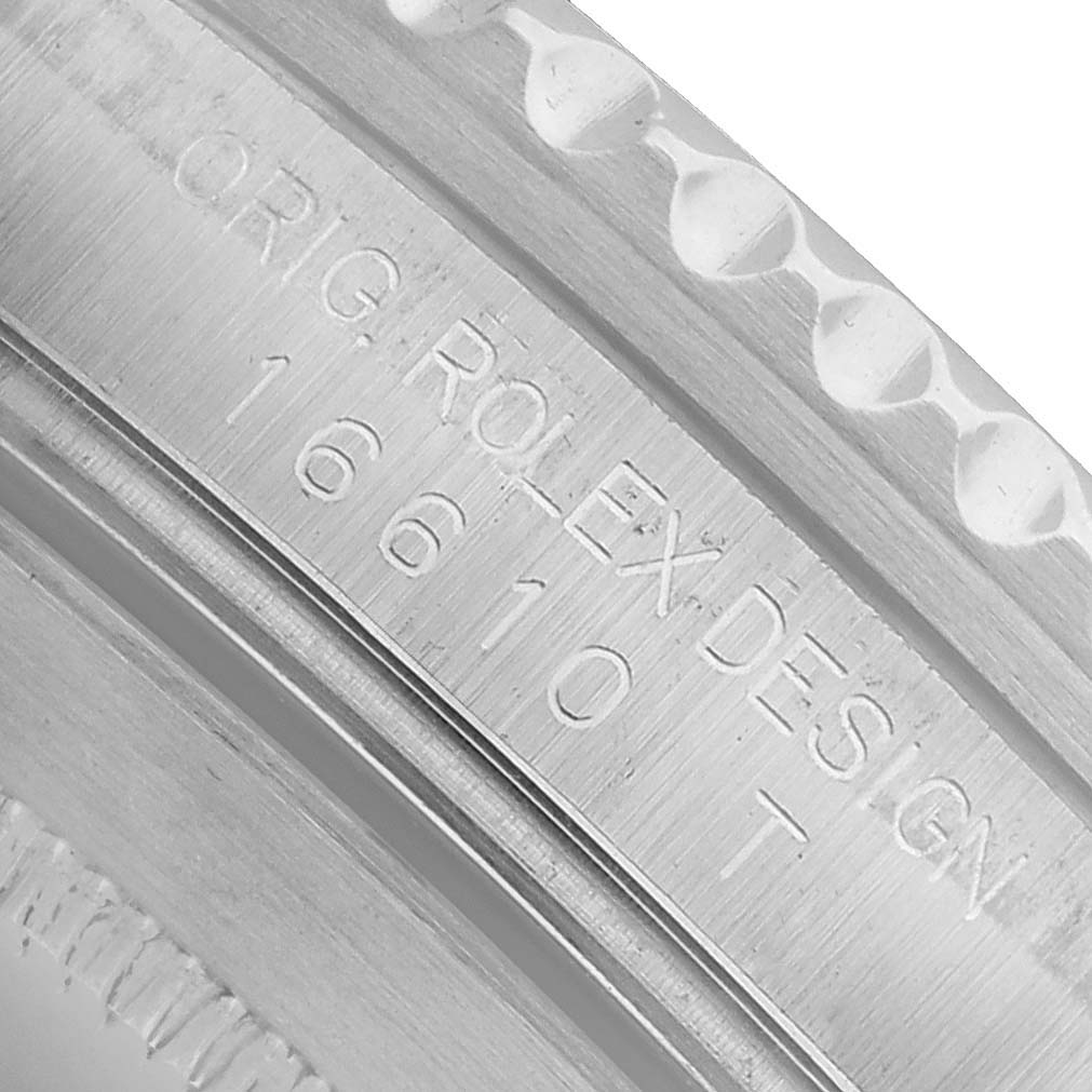 The image shows a close-up of the side engraving on a Rolex Submariner 16610 Men's Stainless Steel Black Dial case, focusing on model details.