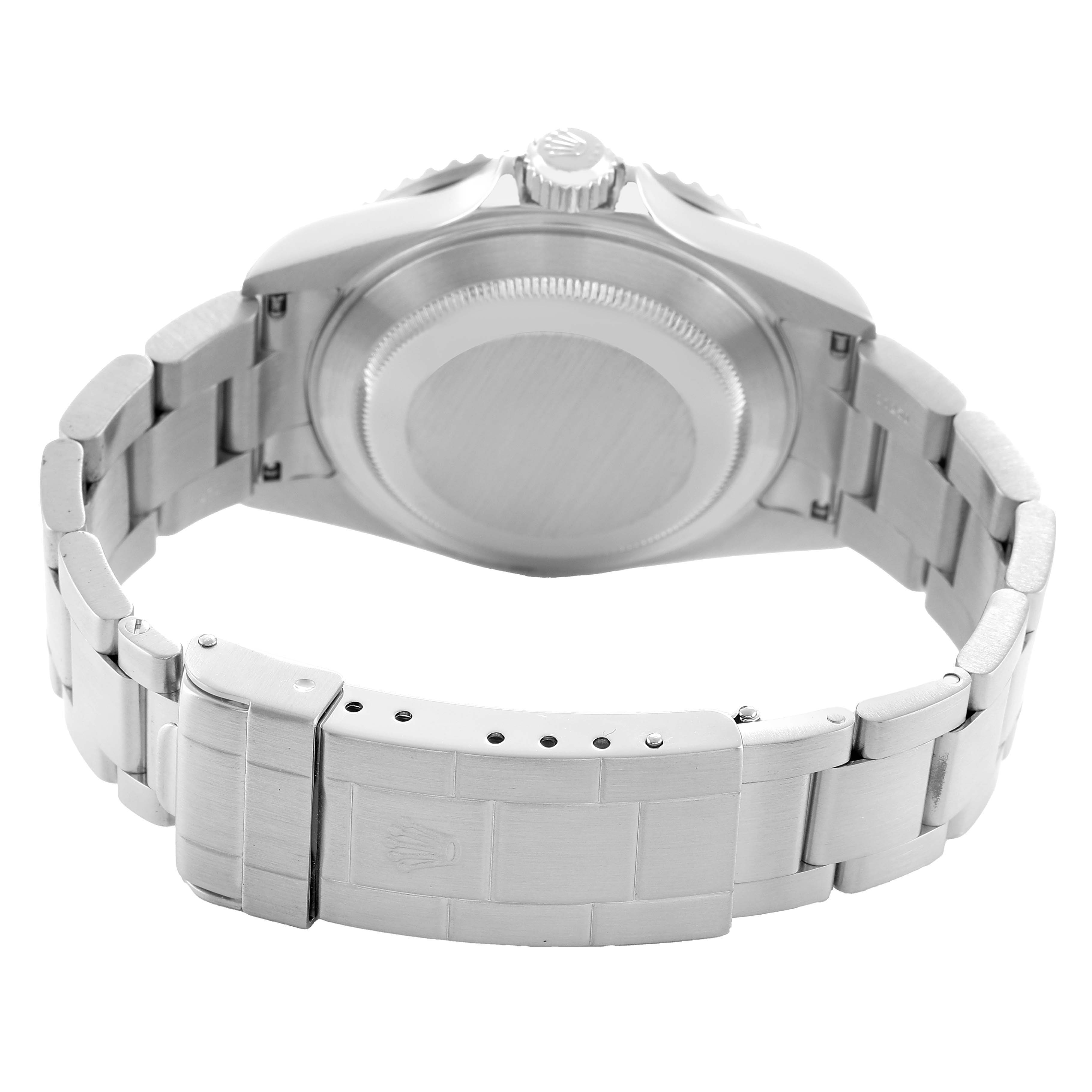 The image shows the back of a Rolex Submariner 16610 Men's Stainless Steel Black Dial watch, focusing on the case, bracelet, and clasp.