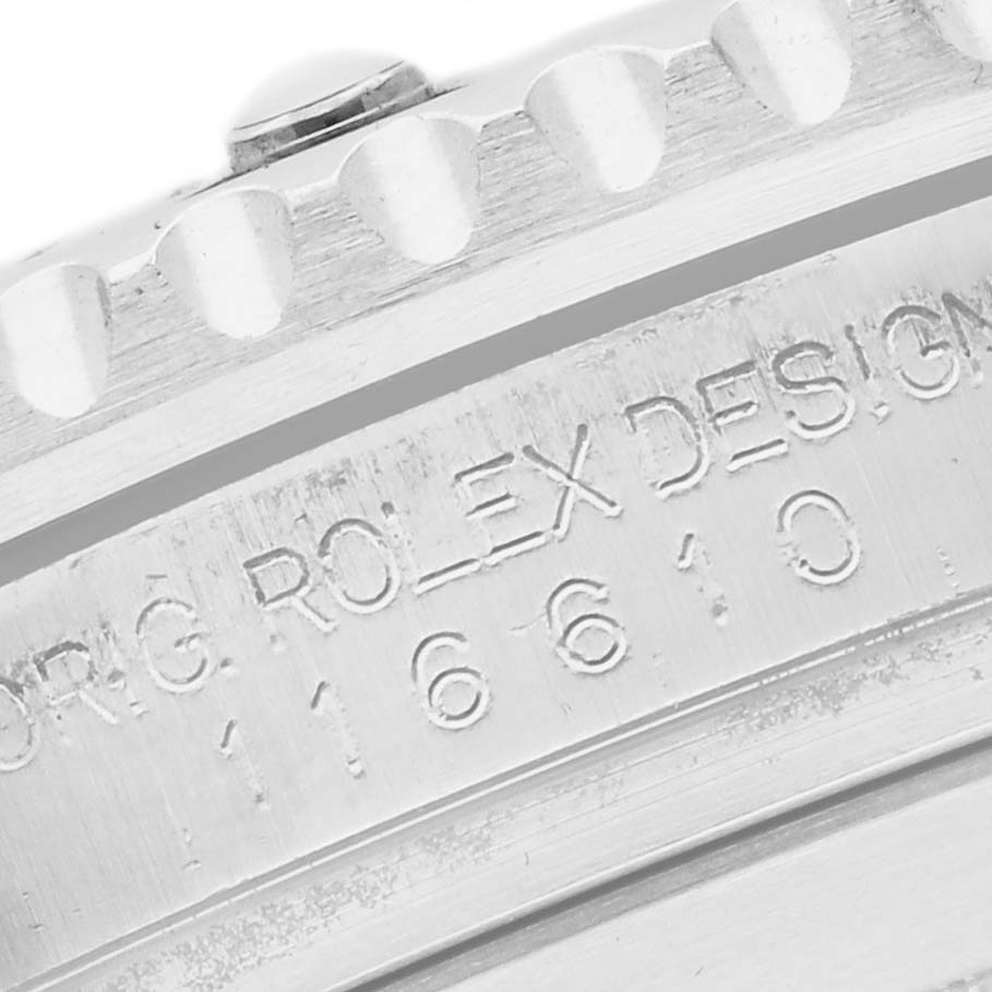 The image shows a close-up of the side engraving on a Rolex Submariner 116610LV Men's Stainless Steel Green Dial's case, highlighting the model number.