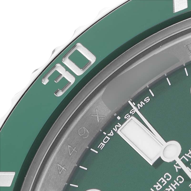 The image shows a close-up of the green bezel and partial dial of a Rolex Submariner 116610LV Men's Stainless Steel Green Dial, highlighting the "30" marker.