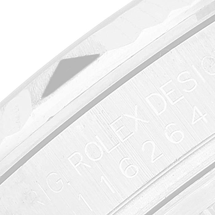 The image shows a close-up of the Rolex Turn-o-Graph 116264 Men
s Stainless Steel White Dial 116264 Men
s Stainless Steel White Dial model
s bezel and inner ring with engraved text.