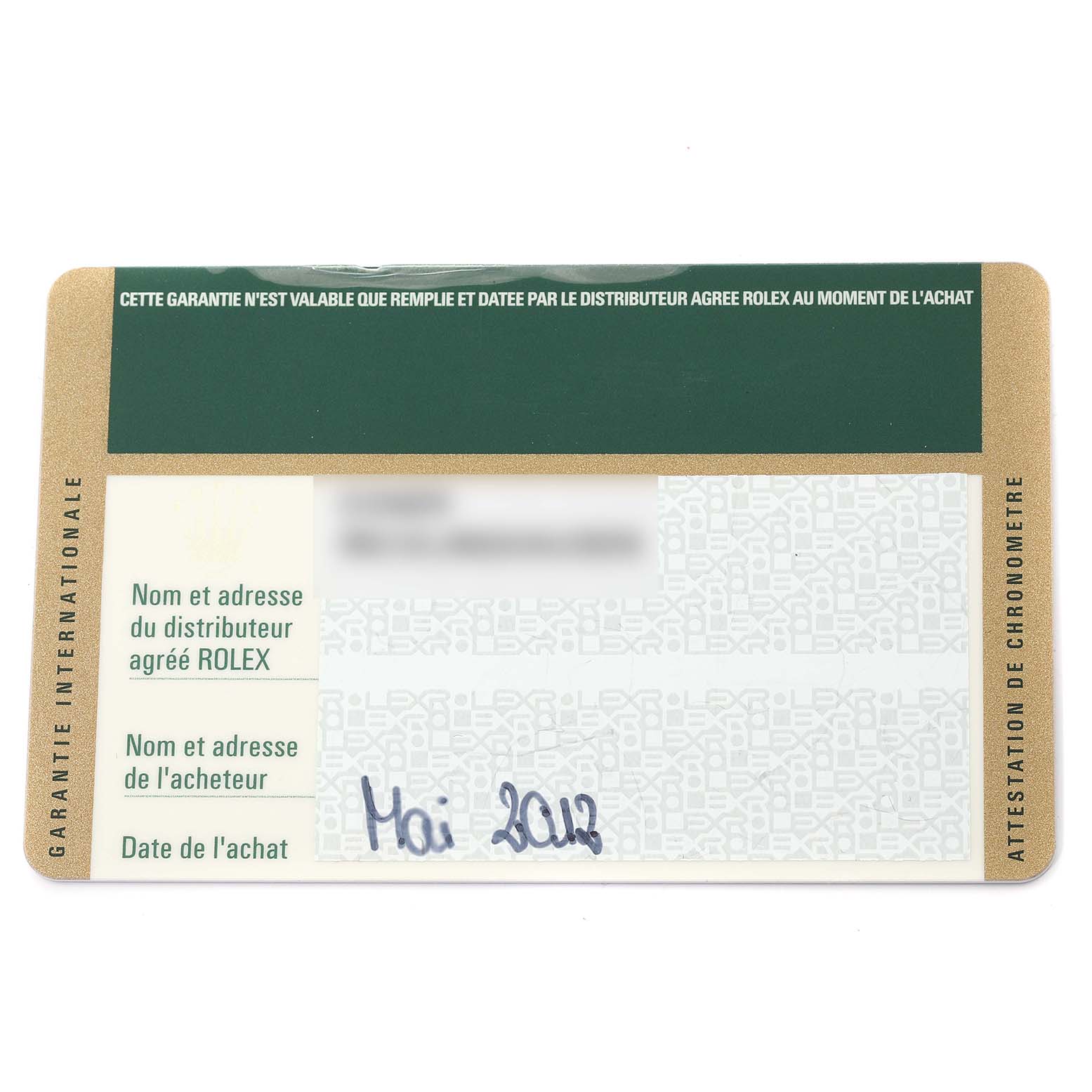 This is the guarantee card for the Rolex Yacht-Master 168623 Women's Steel and Gold (two tone) White Dial 168623 Women's Steel and Gold (two tone) White Dial watch, showing fields for the distributor's and buyer's names, and the purchase date.