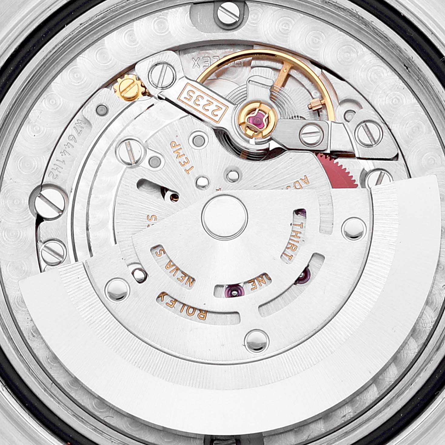 This image shows a close-up of the inner mechanical movement and components of the Rolex Yacht-Master 168623 Women's Steel and Gold (two tone) White Dial 168623 Women's Steel and Gold (two tone) White Dial watch.