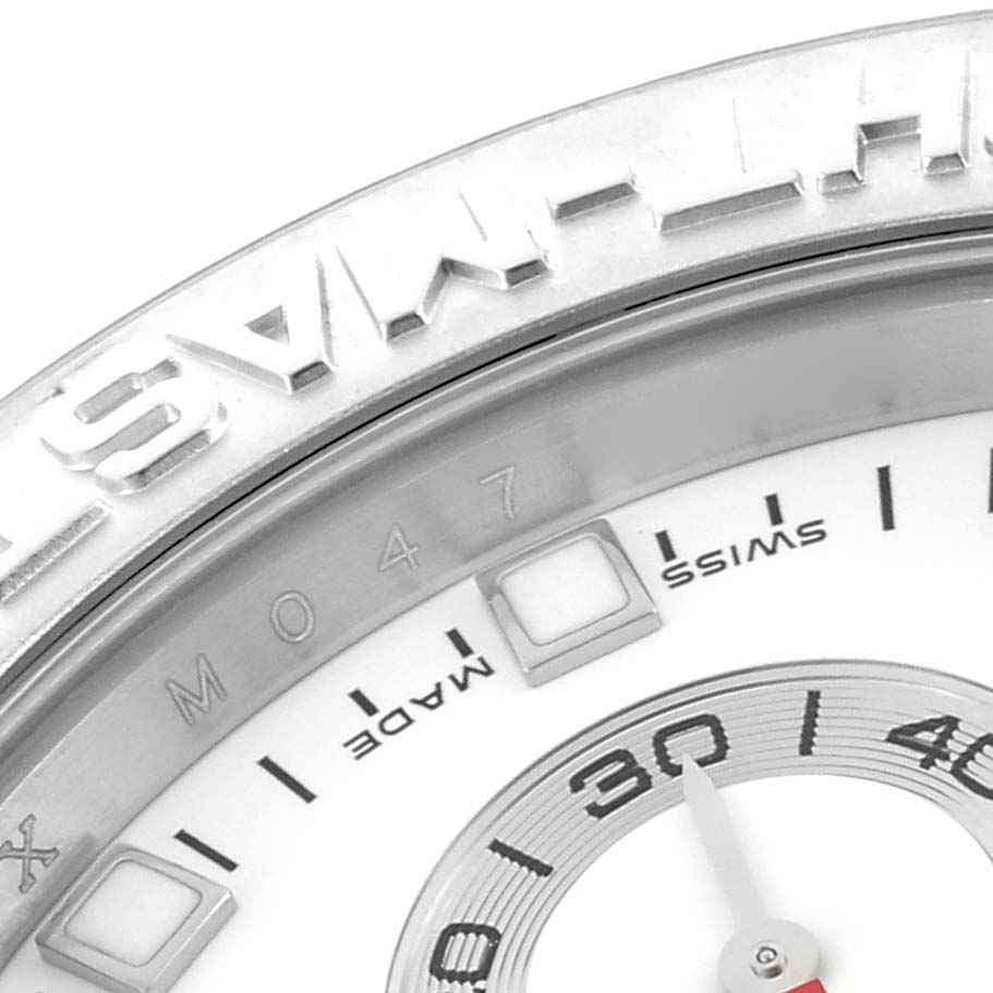 The close-up angle shows the bezel and part of the dial of the Rolex Yacht-Master 116689 Men
s Platinum White Dial 116689 Men
s Platinum White Dial watch featuring the "SWISS MADE" text.