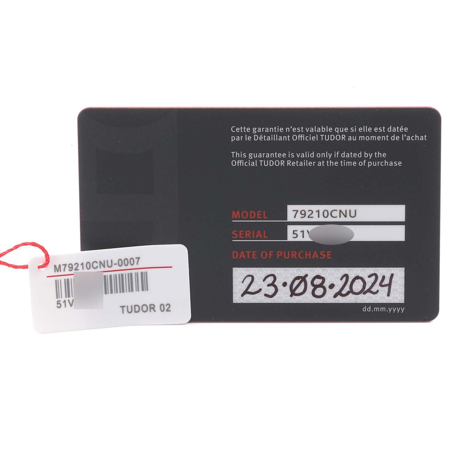 The image shows a warranty card for the Tudor Heritage Black Bay 79210CNU Men's Ceramic Blue Dial 79210CNU Men's Ceramic Blue Dial watch, including the model and serial number.