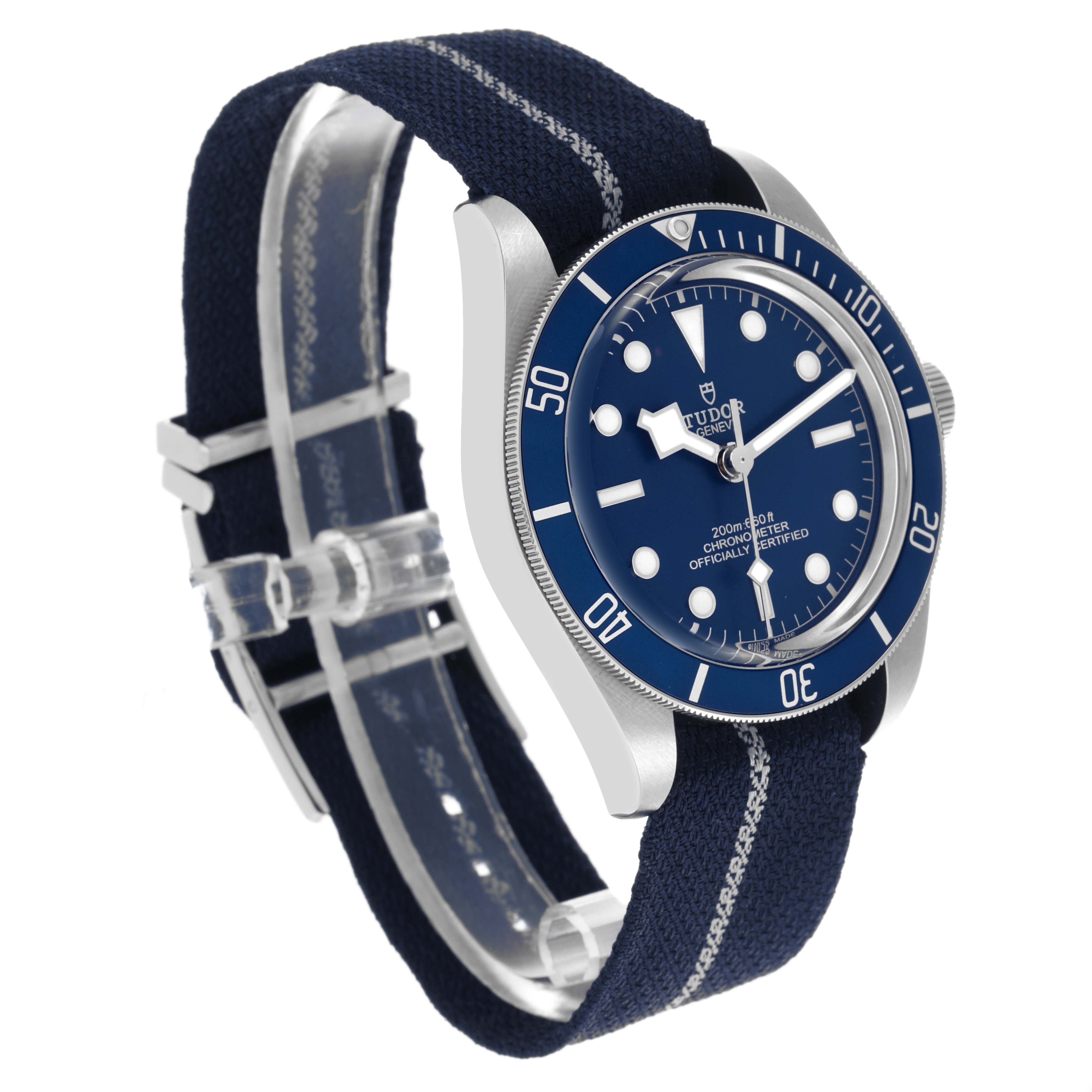 The Tudor Heritage Black Bay 79030 Men's Stainless Steel Blue Dial 79030 Men's Stainless Steel Blue Dial watch is shown at a side angle, highlighting the blue bezel, dial, and fabric strap.