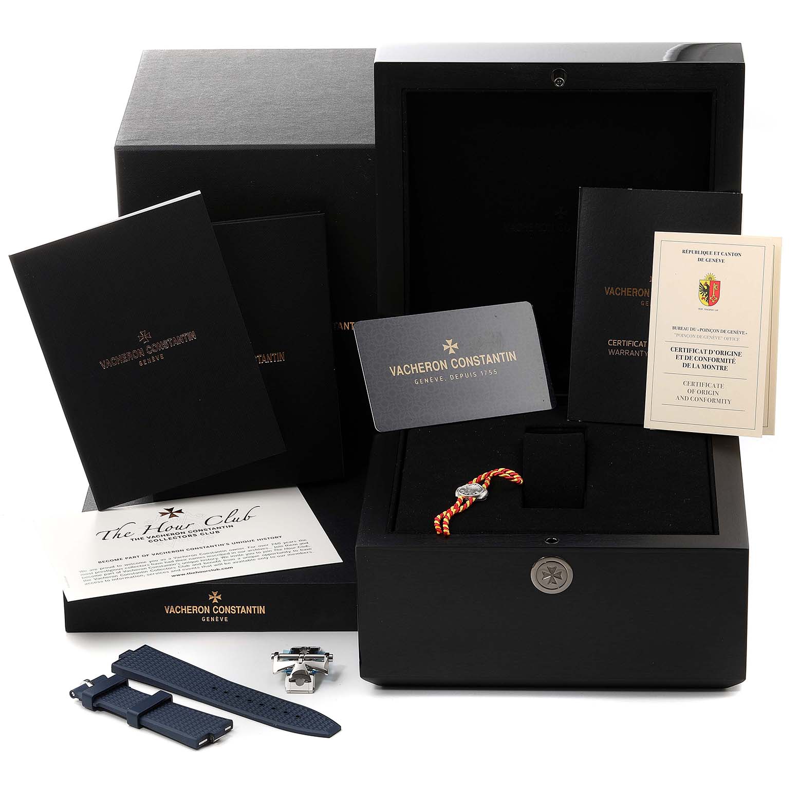 The image shows the Vacheron Constantin Overseas 7900V/110A-B334 Men's Stainless Steel Blue Dial 7900V/110A-B334 Men's Stainless Steel Blue Dial model watch, its box, warranty cards, extra strap, and accessories, viewed from the front.