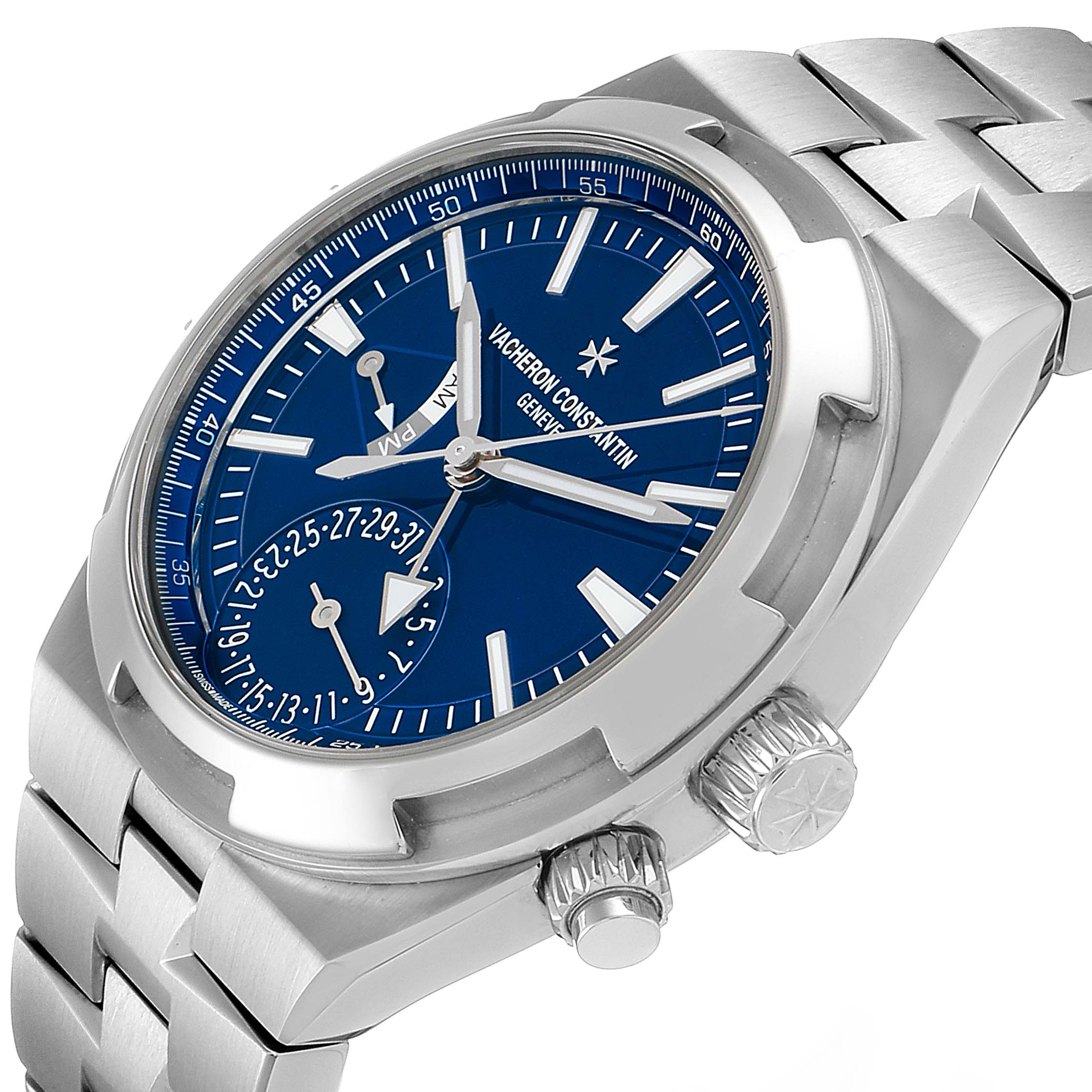 This image shows a Vacheron Constantin Overseas 7900V/110A-B334 Men's Stainless Steel Blue Dial 7900V/110A-B334 Men's Stainless Steel Blue Dial model watch at a three-quarter angle highlighting the blue dial, hands, bracelet, and crown.