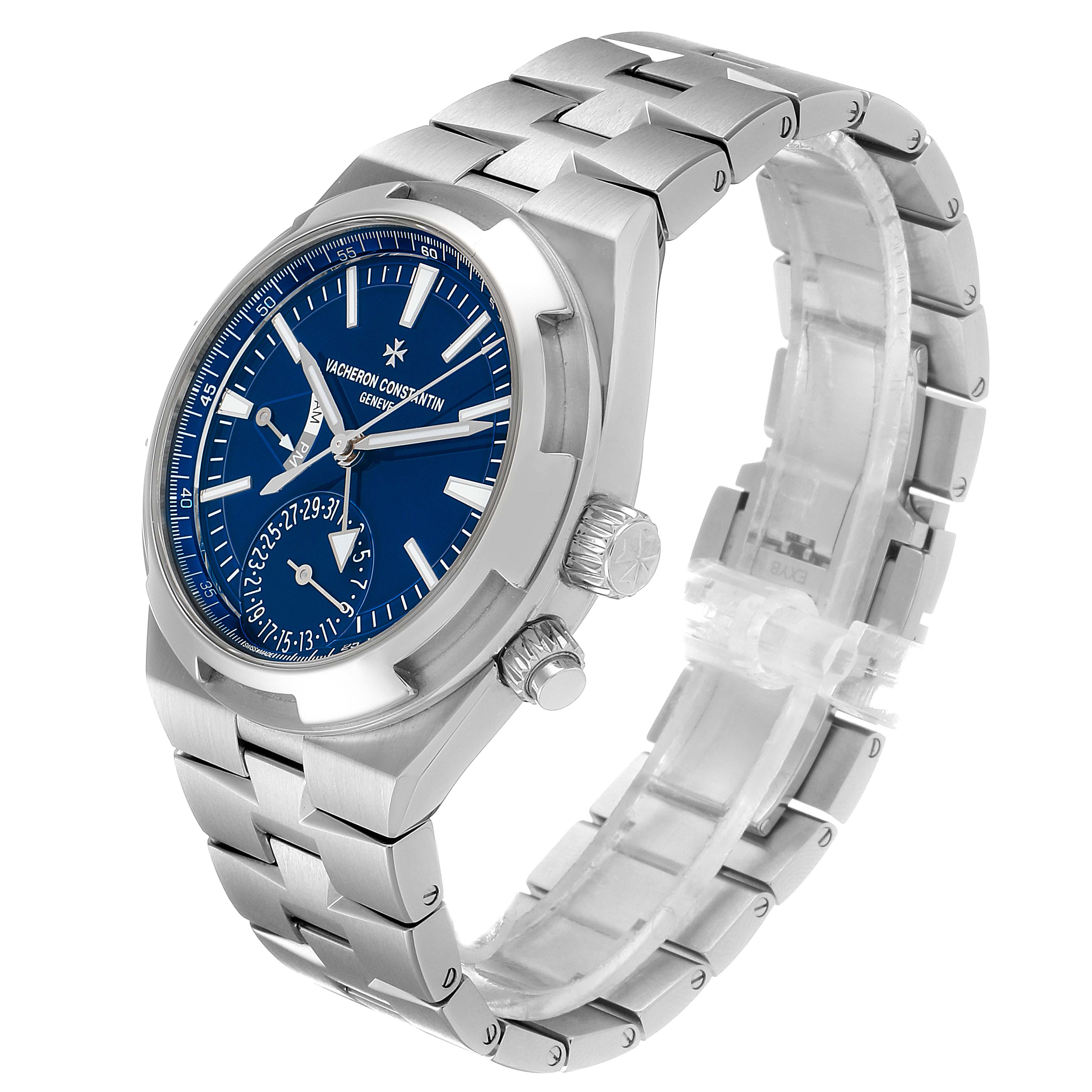 The Vacheron Constantin Overseas 7900V/110A-B334 Men's Stainless Steel Blue Dial 7900V/110A-B334 Men's Stainless Steel Blue Dial watch is shown at a three-quarter angle highlighting the blue dial, stainless steel case, and bracelet.