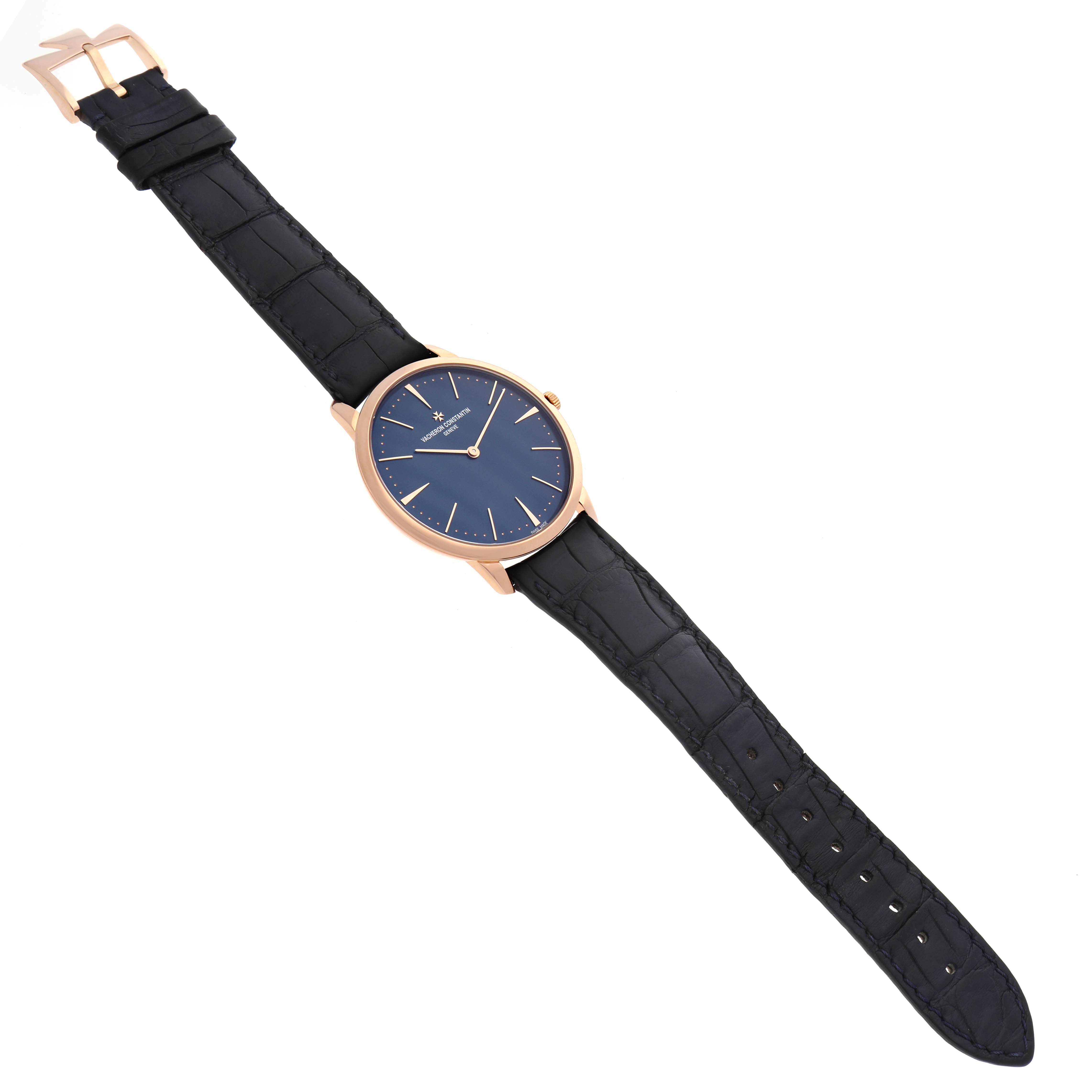 The Patrimony by Vacheron Constantin is shown from a top angle, displaying the full watch, including the face and strap.