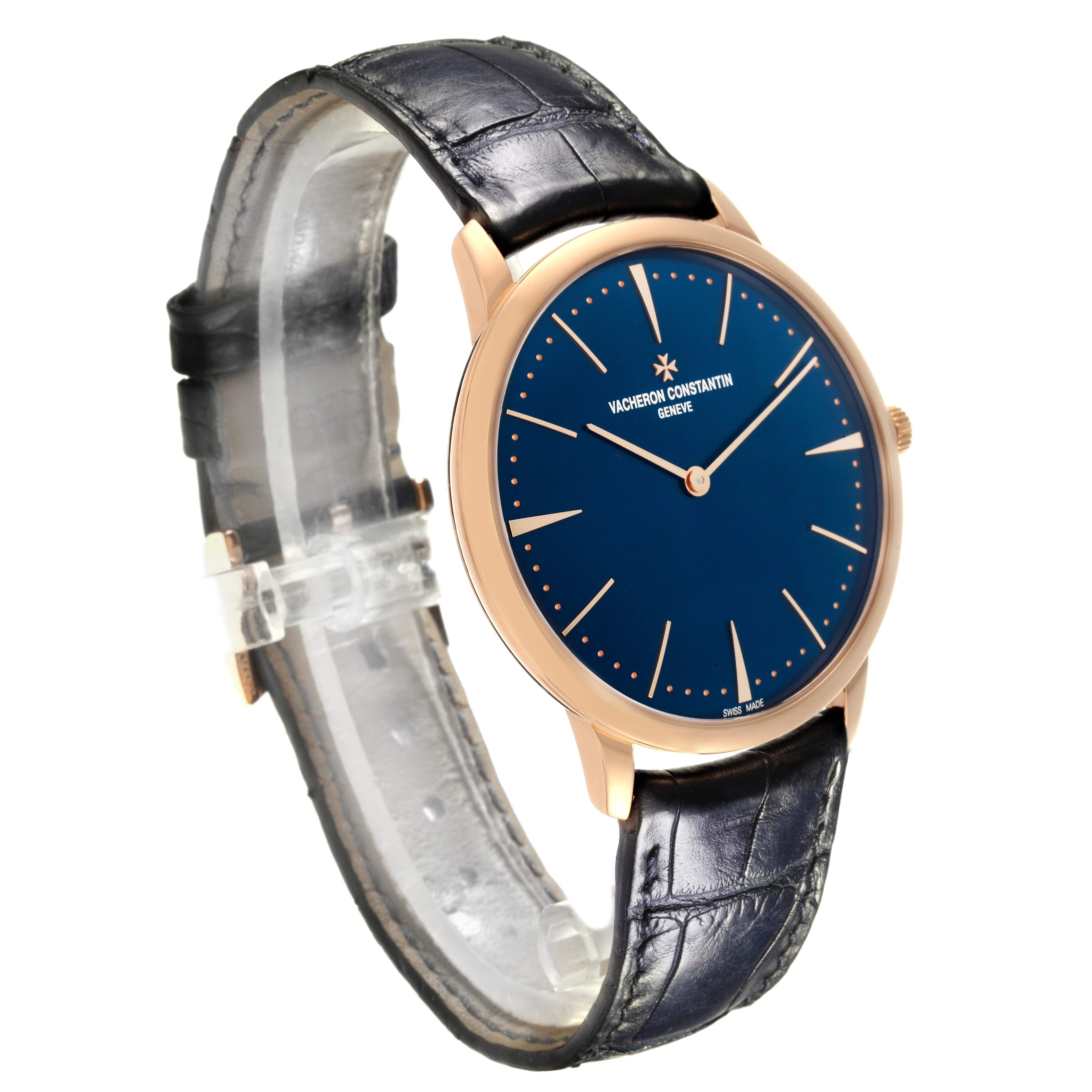 The Vacheron Constantin Patrimony 81180/000R-B518 Men's Rose Gold Blue Dial 81180/000R-B518 Men's Rose Gold Blue Dial watch is shown at a side angle, highlighting the blue dial, gold case, and black leather strap.