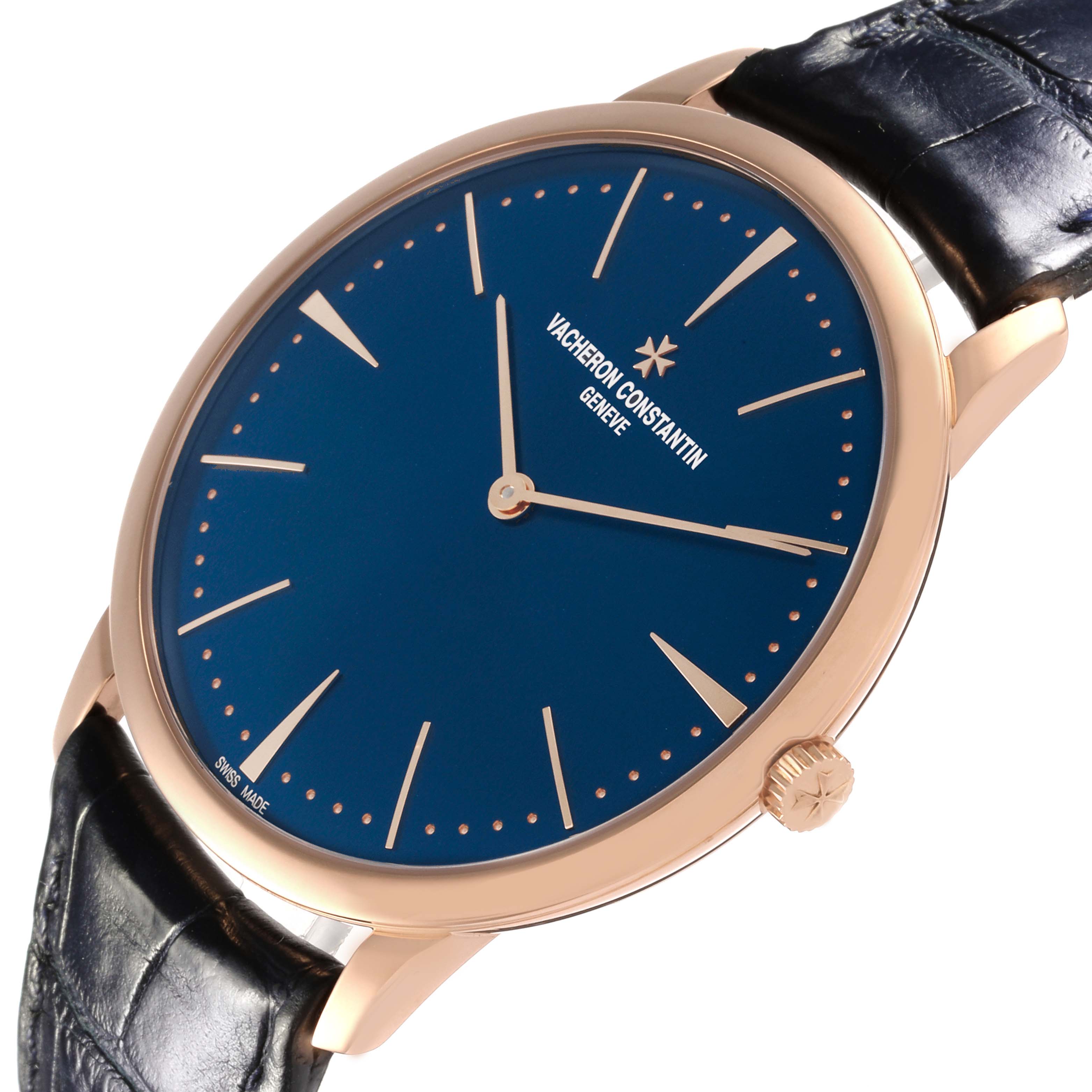 The Vacheron Constantin Patrimony 81180/000R-B518 Men's Rose Gold Blue Dial 81180/000R-B518 Men's Rose Gold Blue Dial watch is shown at a tilted angle displaying its dial, case, crown, and strap.