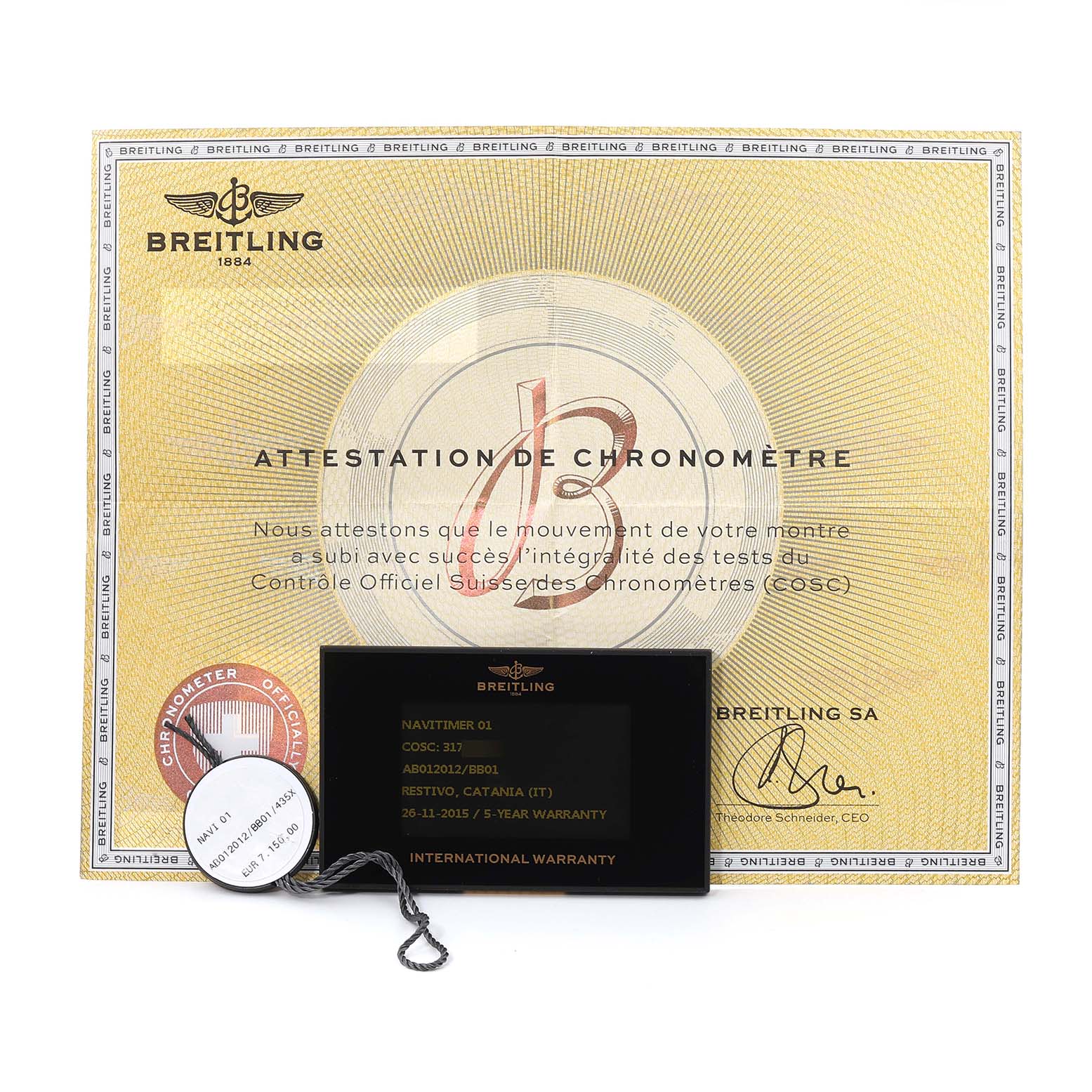 The image shows Breitling Navitimer AB0120 Men
s Stainless Steel Black Dial AB0120 Men
s Stainless Steel Black Dial 01 accessories including a warranty card, chronometer certificate, and a tag.