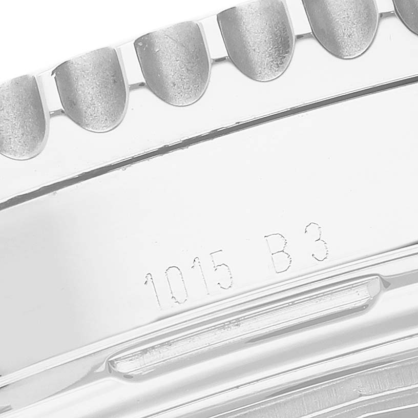 This close-up shows the bezel and engraved serial number on a Breitling Navitimer AB0120 Men
s Stainless Steel Black Dial AB0120 Men
s Stainless Steel Black Dial watch.