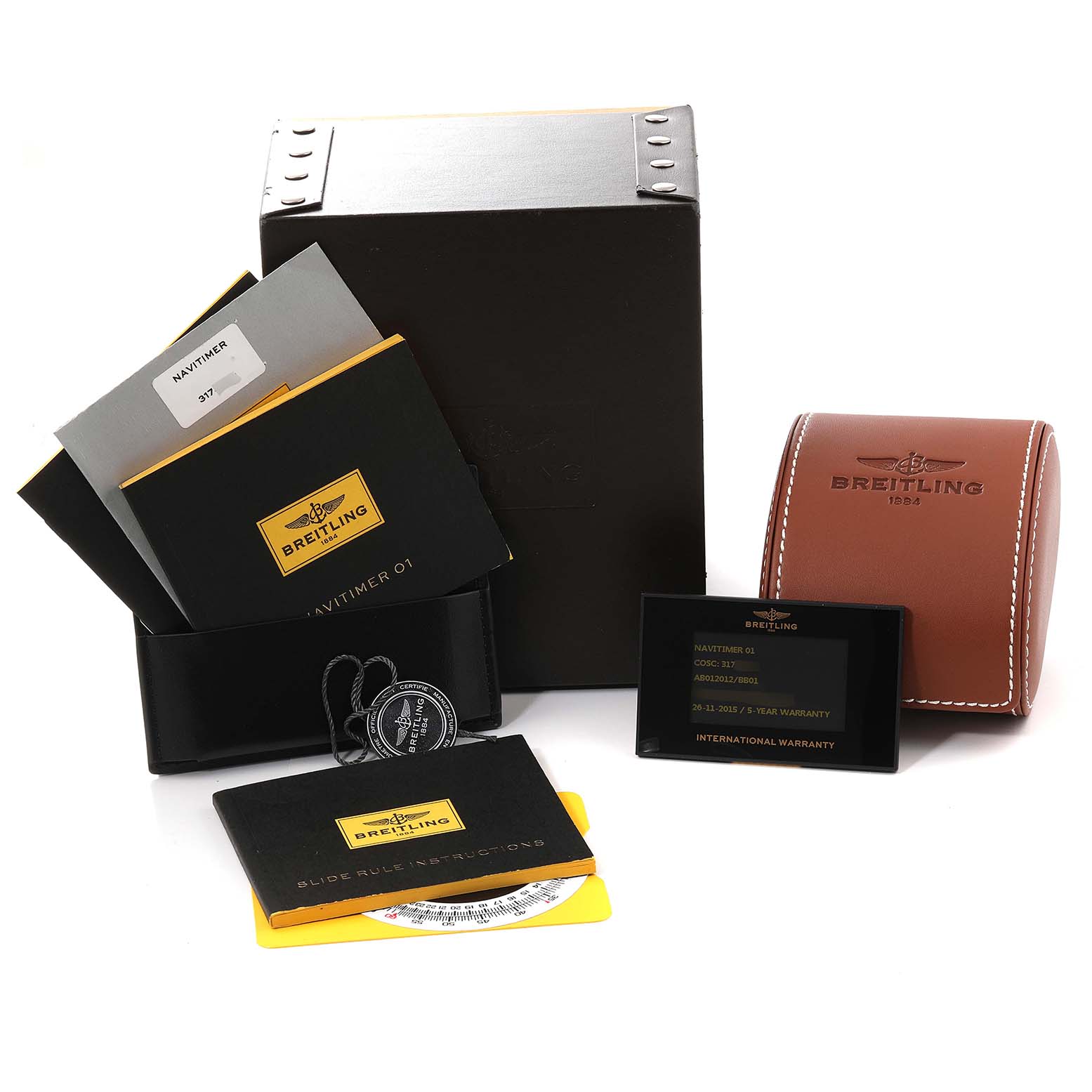 The image shows the Breitling Navitimer AB0120 Men
s Stainless Steel Black Dial AB0120 Men
s Stainless Steel Black Dial watch accessories including manuals, warranty card, box, and travel case.