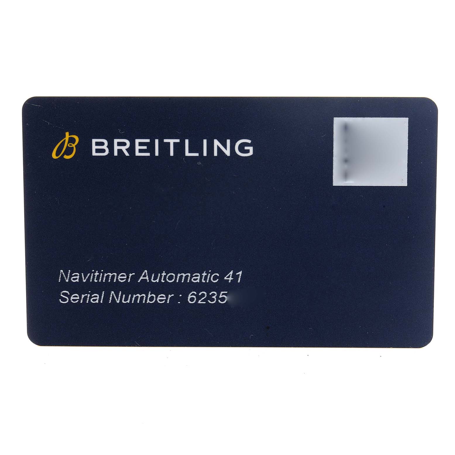 The image shows a Breitling Navitimer A17326 Men
s Stainless Steel Blue Dial A17326 Men
s Stainless Steel Blue Dial Automatic 41 serial number card from a top-down angle.