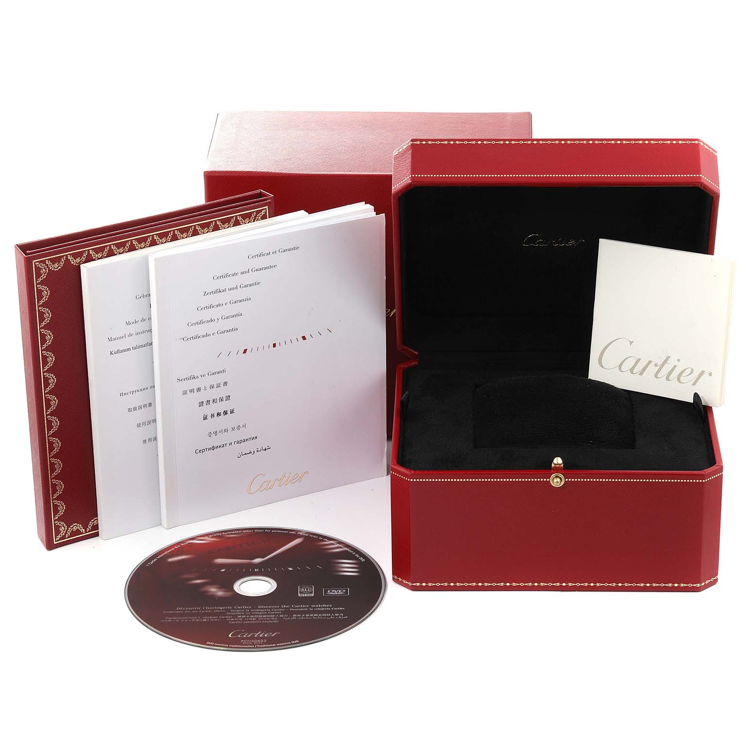 The image shows the packaging and accessories of the Ballon Bleu by Cartier, including a box, booklets, and a CD.