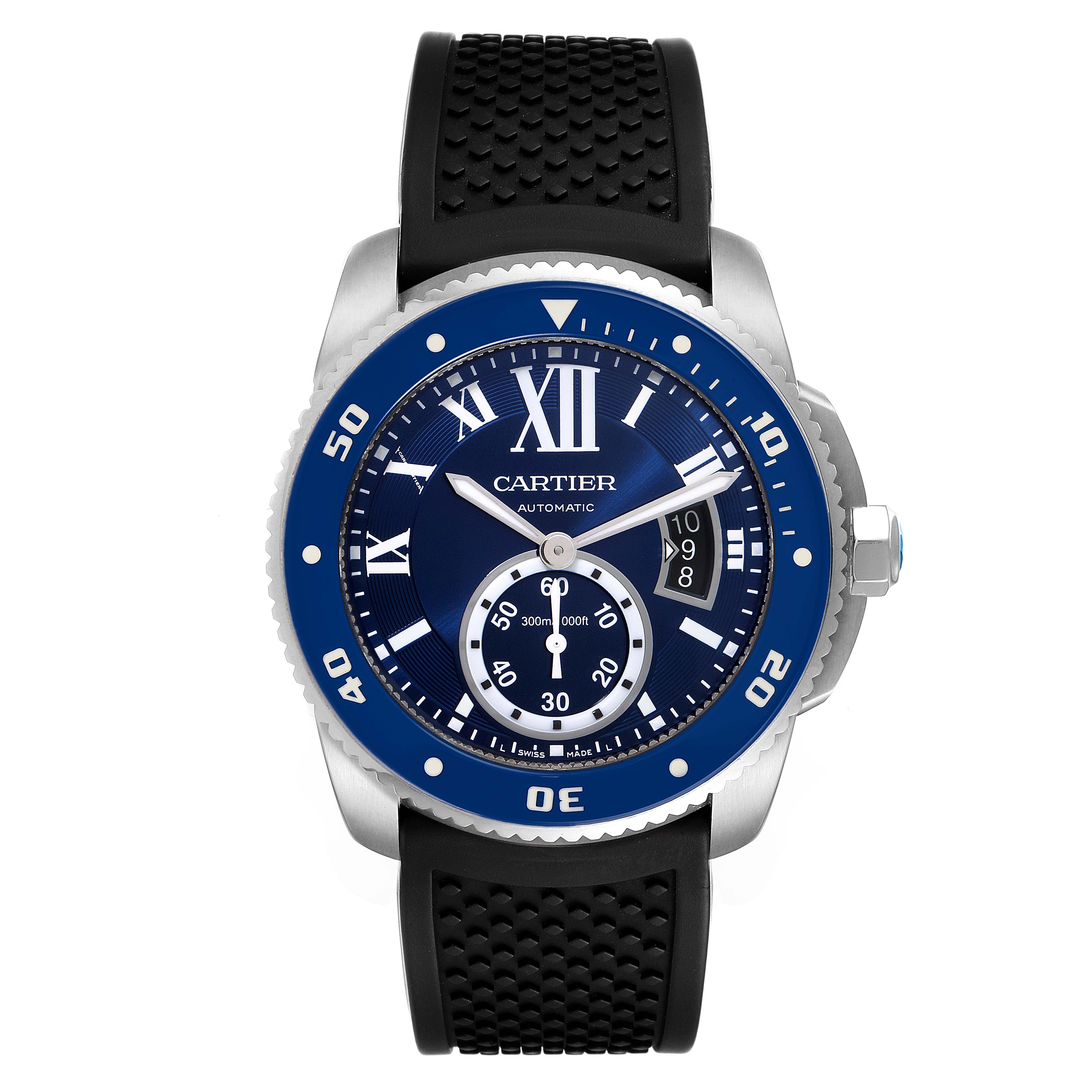 The image shows a front view of the Calibre de Cartier watch by Cartier, highlighting the face, bezel, and rubber strap.