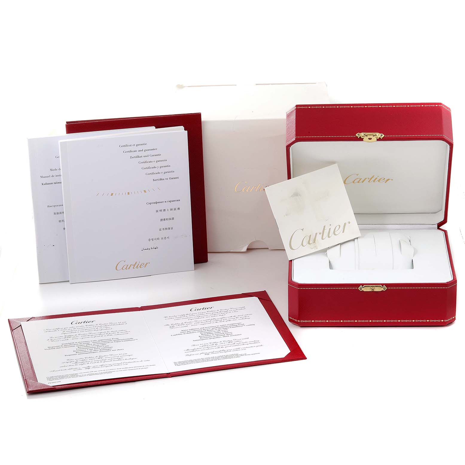 The image shows the packaging and documents for the Calibre de Cartier watch by Cartier.