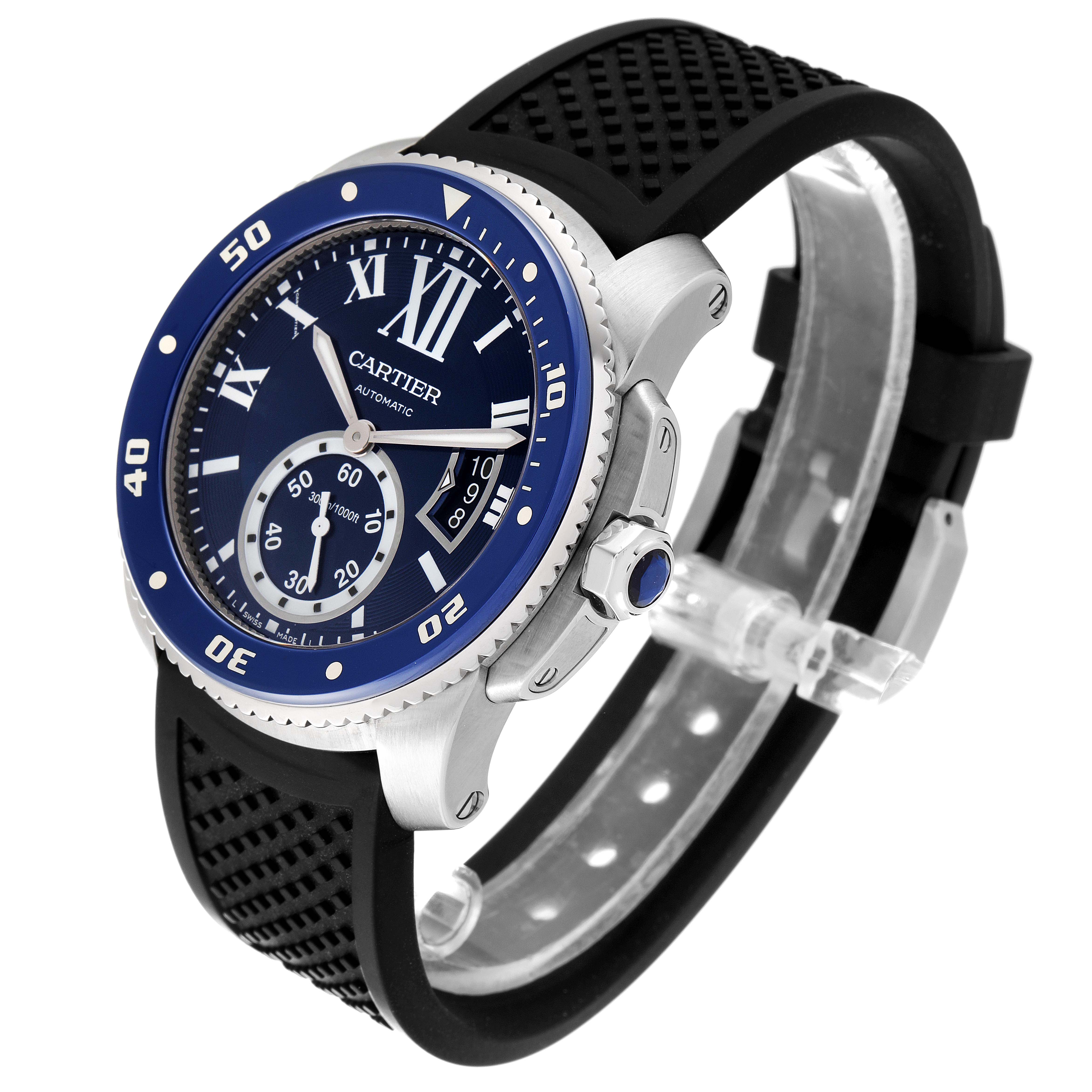 The Calibre de Cartier watch by Cartier is shown at a three-quarter angle, highlighting its face, bezel, crown, and black strap.