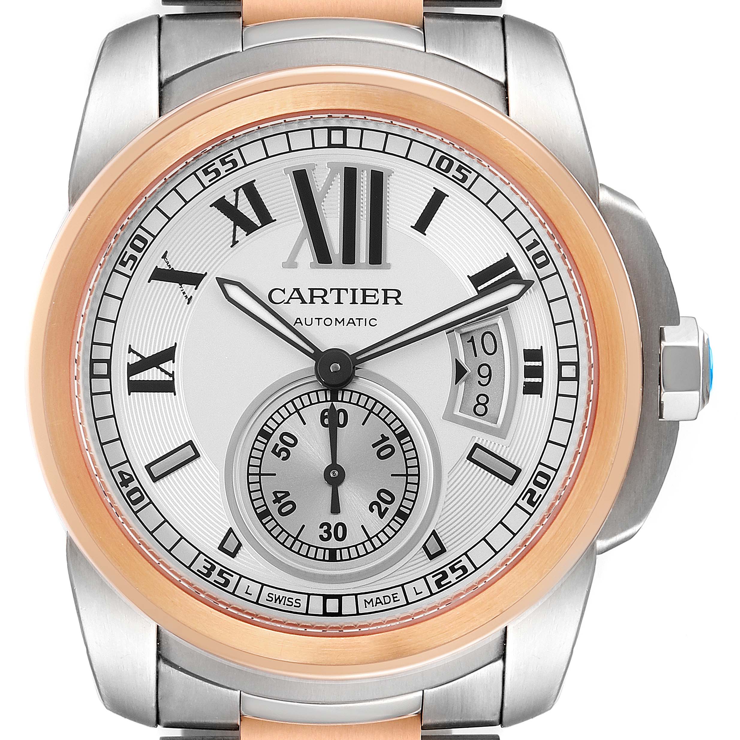 This is a close-up of the Calibre de Cartier by Cartier showing the watch face, bezel, and part of the bracelet.