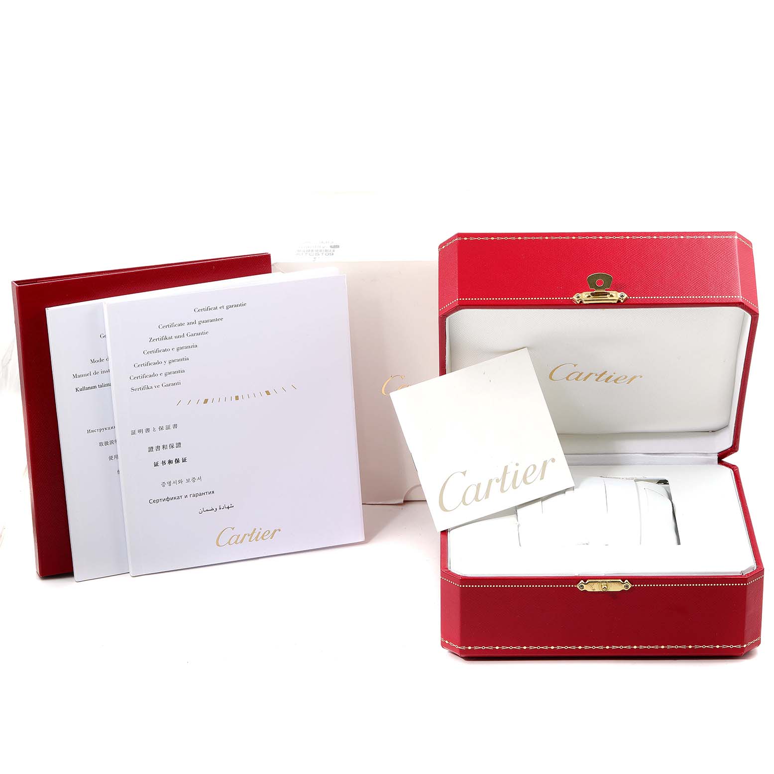 The image shows the packaging and documentation for a Calibre de Cartier watch by Cartier, including the box and papers.