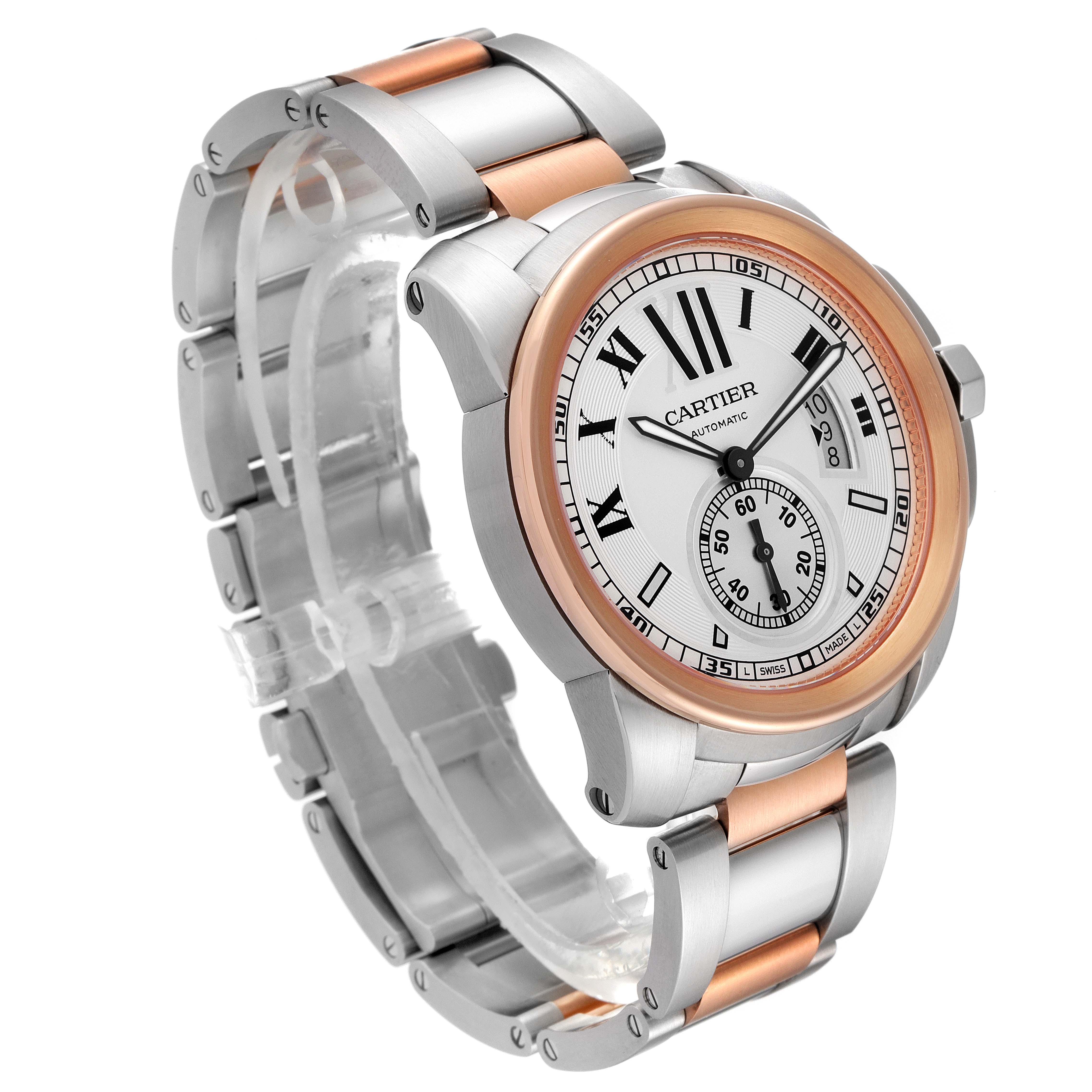 The image shows a Calibre de Cartier watch by Cartier from a front angled view, displaying the face and part of the bracelet.