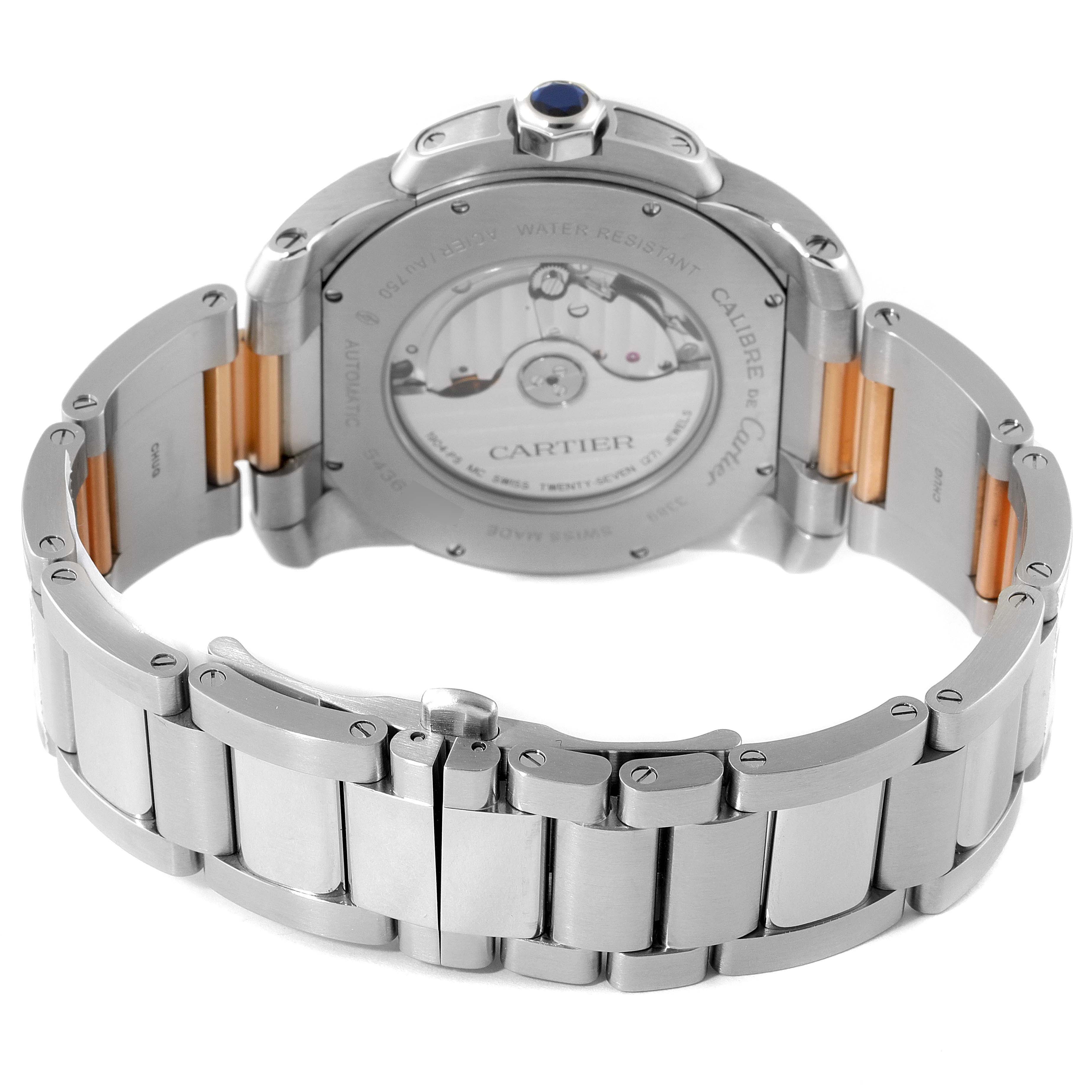 The image shows the back view of the Calibre de Cartier model by Cartier, highlighting its automatic movement and bracelet.