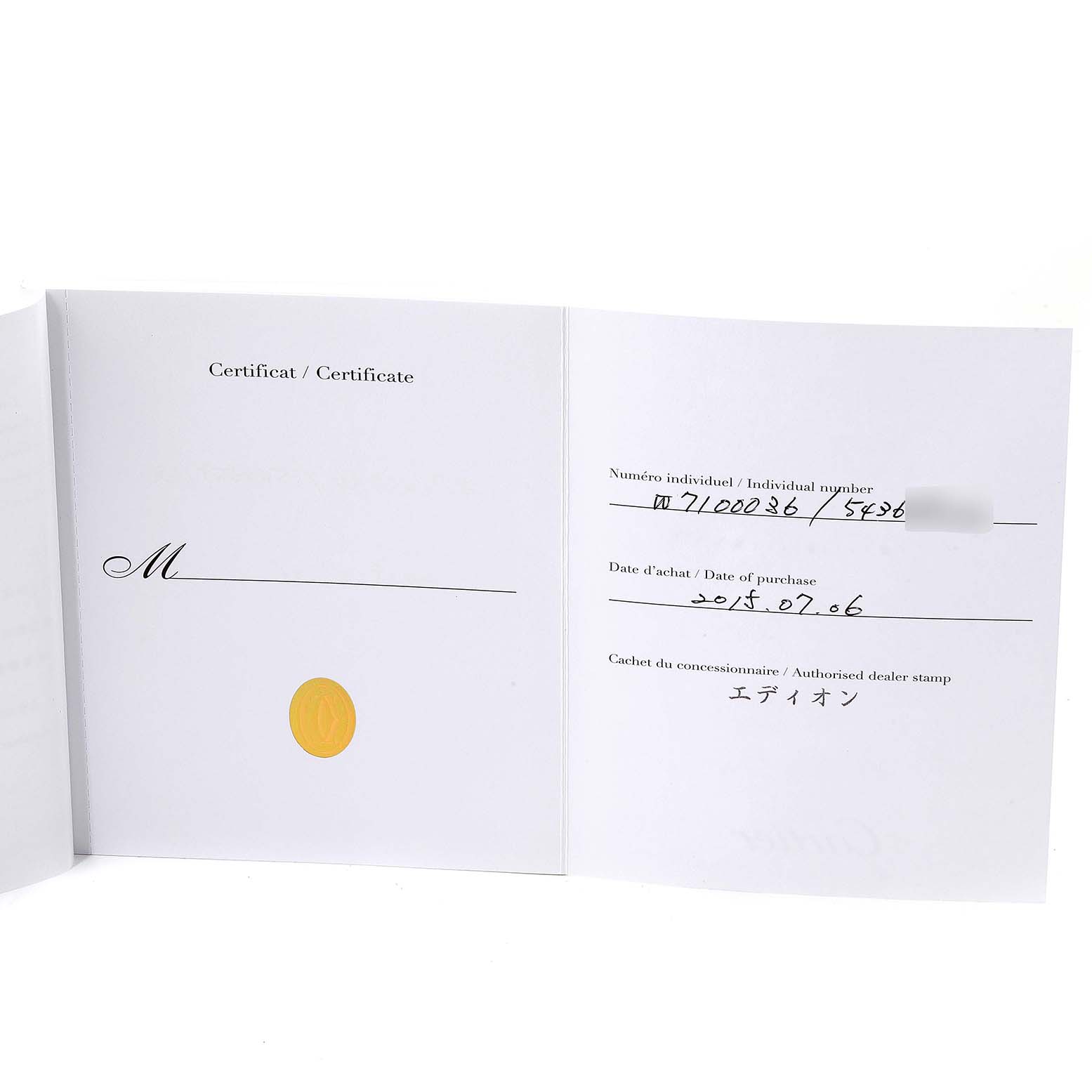 This image shows the certificate of authenticity for the Calibre de Cartier watch by Cartier, with purchase details.