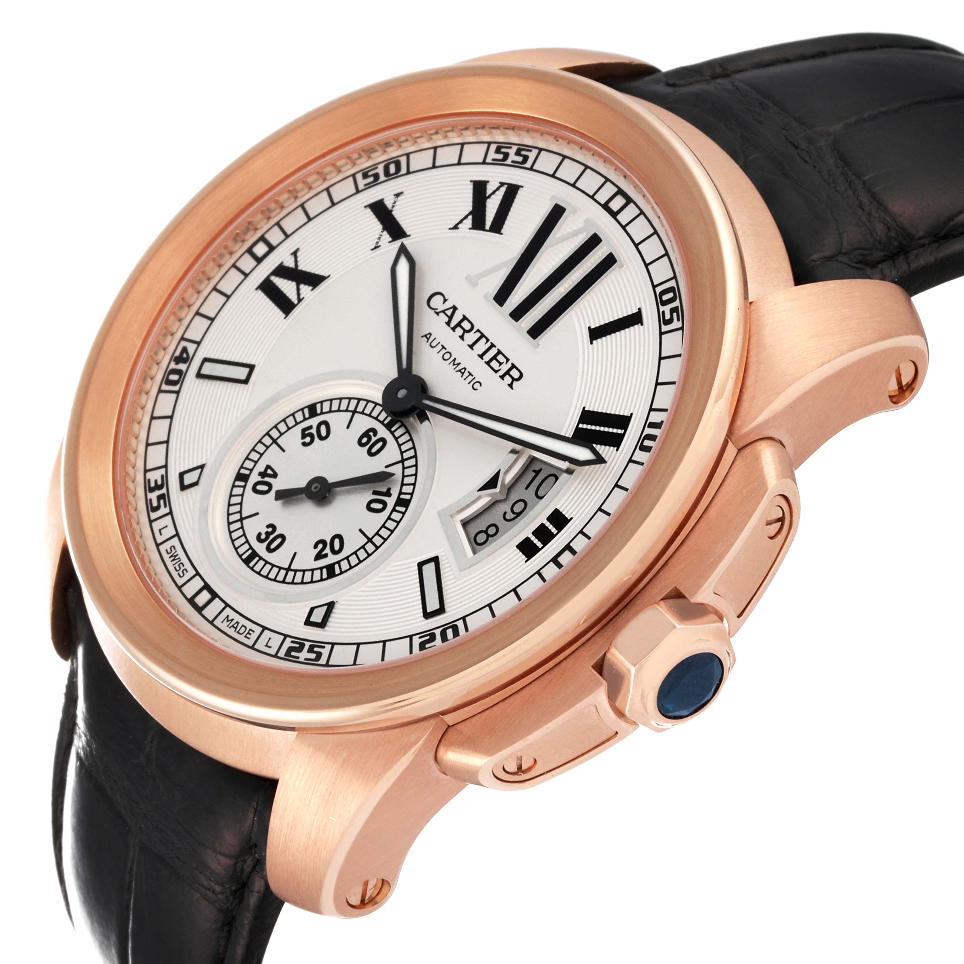 The image shows a close-up angle of a Calibre de Cartier watch by Cartier, featuring its face, bezel, crown, and strap.