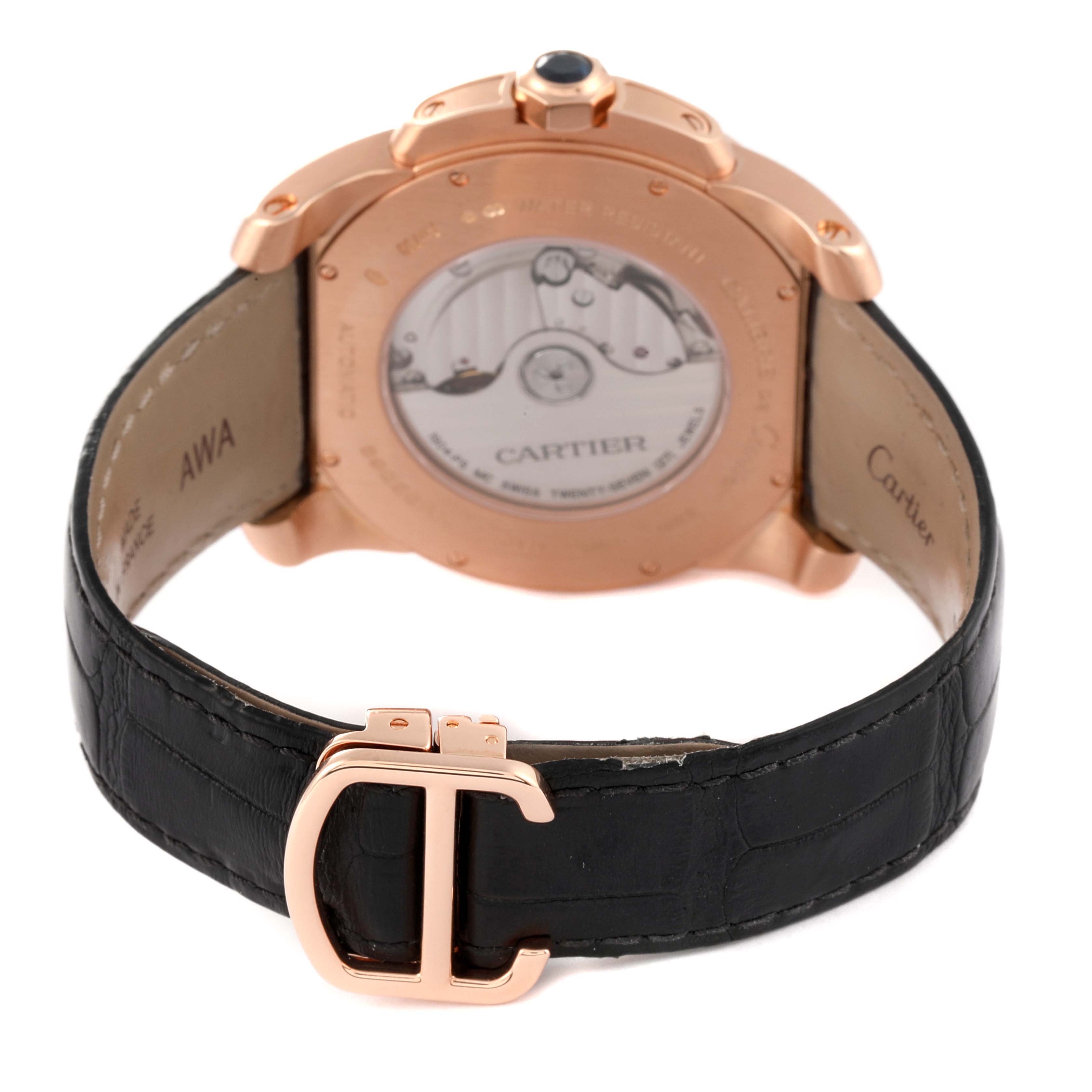 This image shows the back view of the Calibre de Cartier model by Cartier, highlighting the movement mechanism, case, and strap clasp.