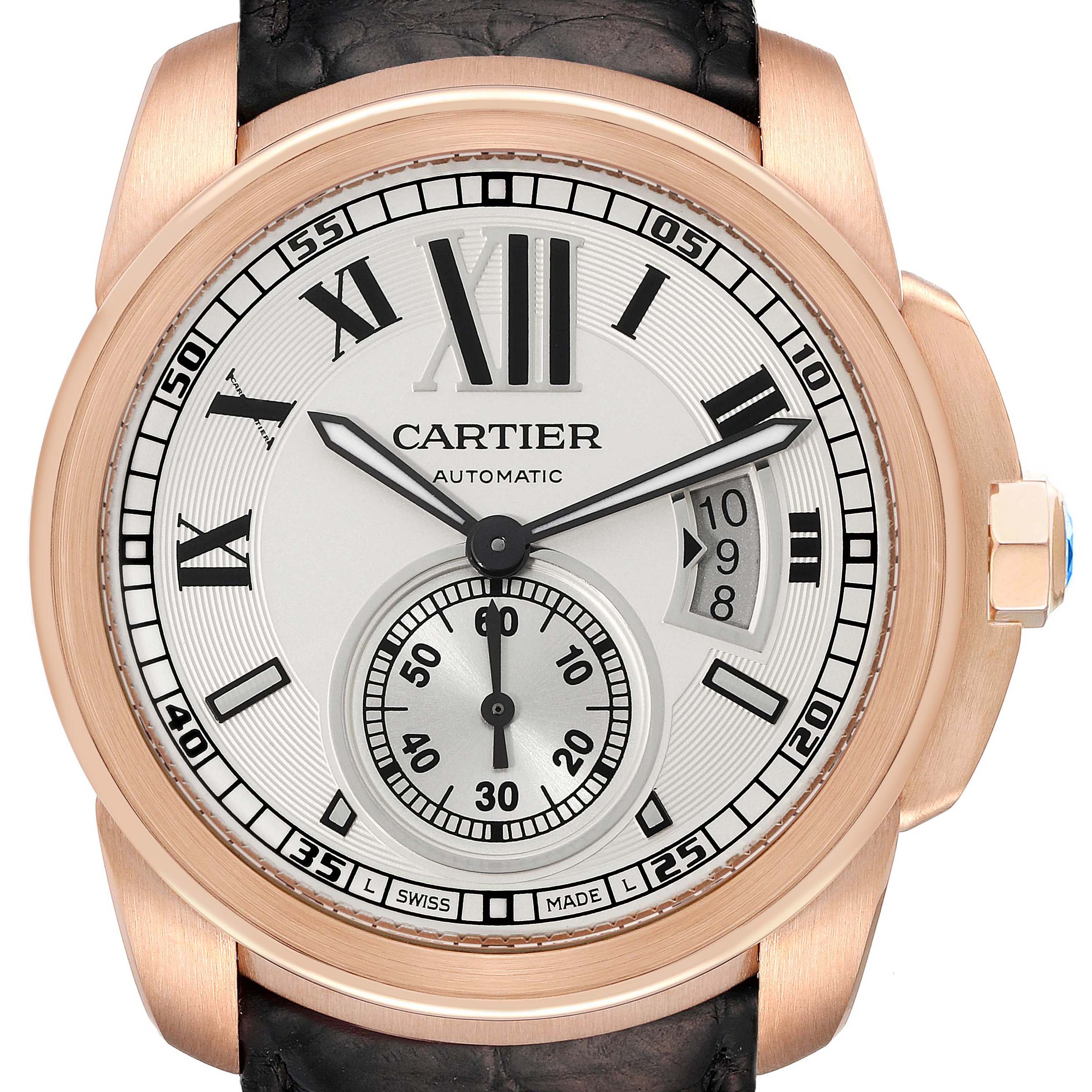 The Calibre de Cartier watch is shown from the front, highlighting the dial, hands, date, and sub-dial.