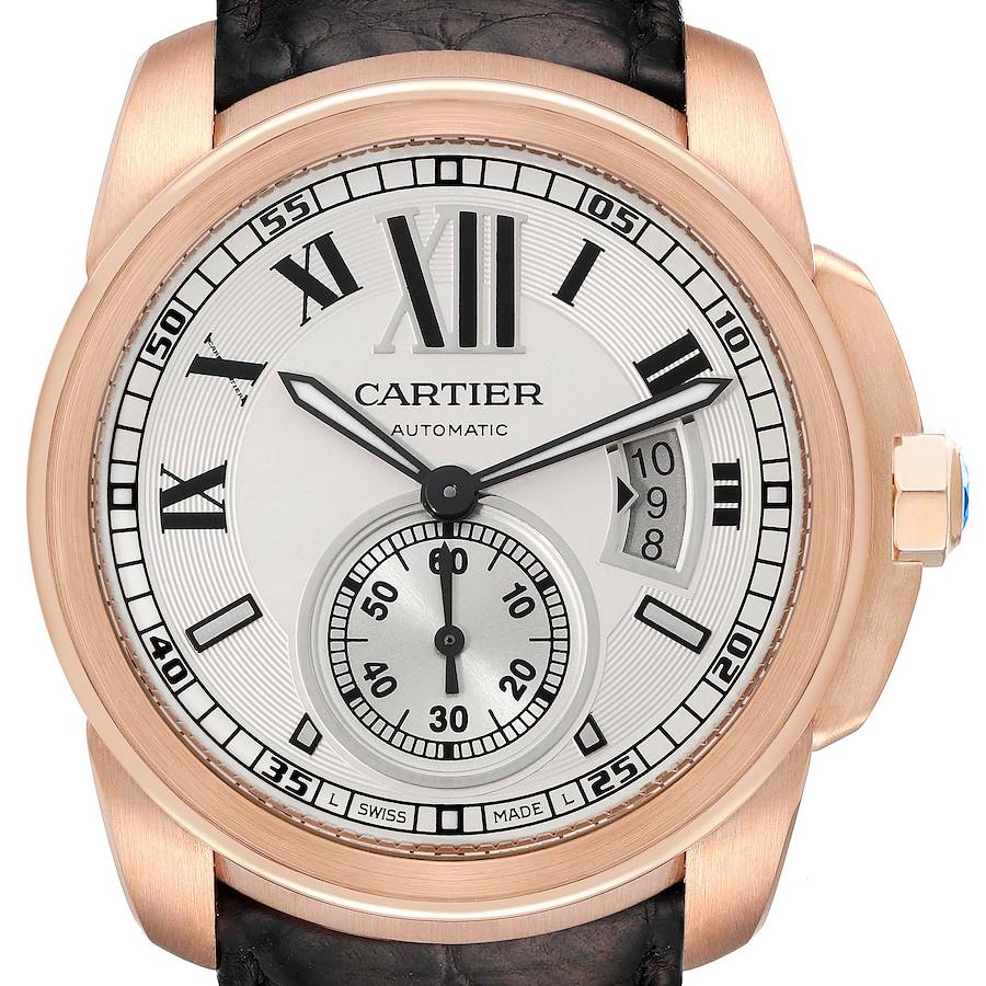The Calibre de Cartier watch is shown from the front, highlighting the dial, hands, date, and sub-dial.
