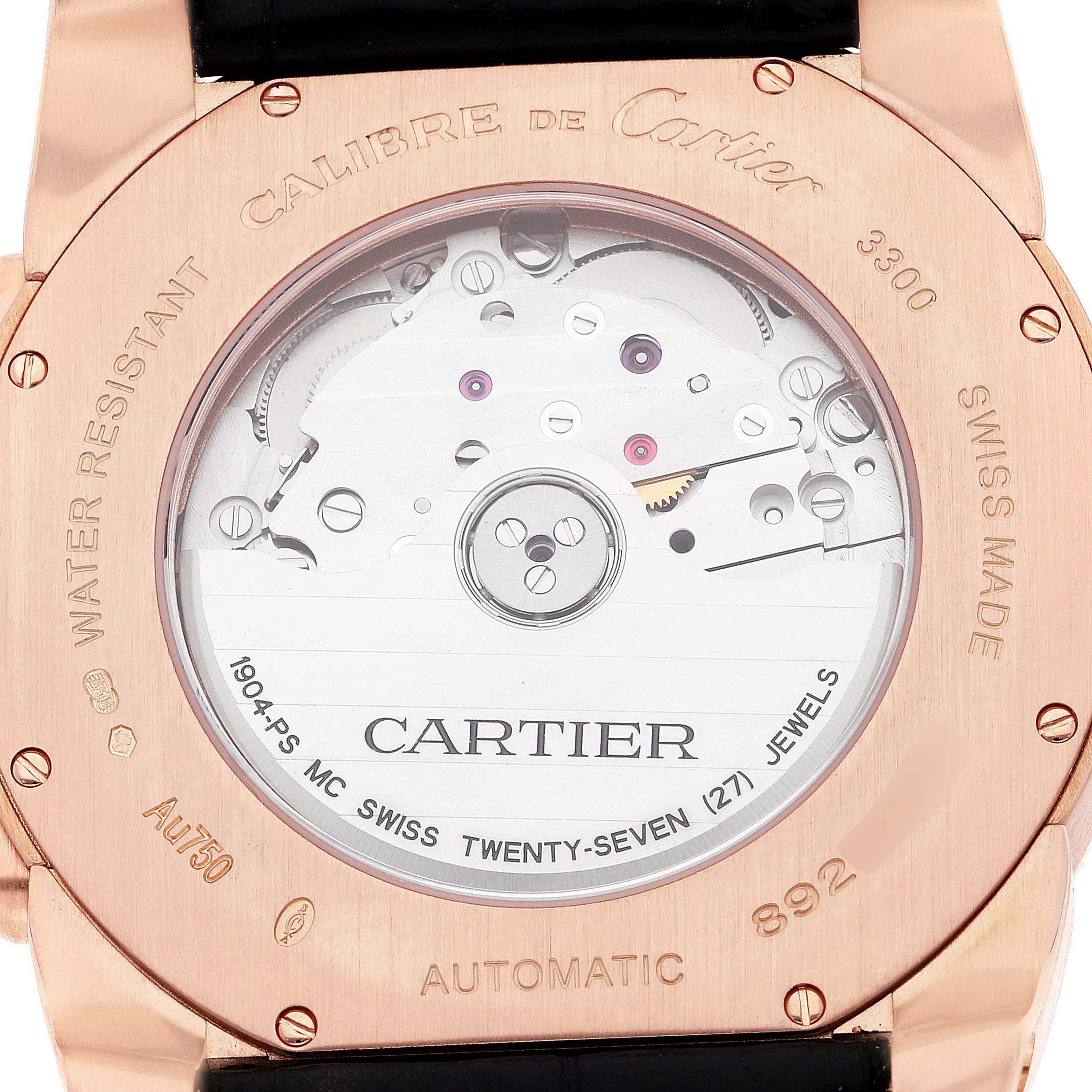 The image shows the back of the Calibre de Cartier watch, highlighting its automatic movement through a transparent case back.