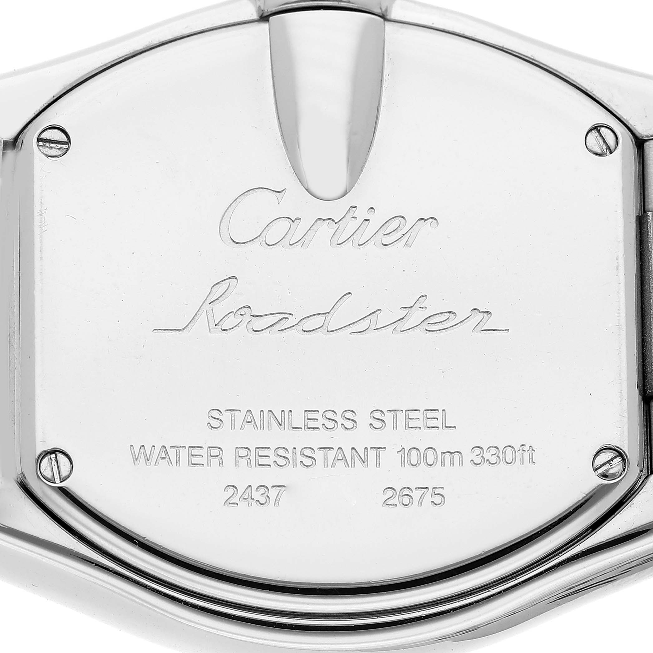 The image shows the back casing of the Cartier Roadster W62016V3 Women's Stainless Steel Silver Dial W62016V3 Women's Stainless Steel Silver Dial watch, displaying its inscriptions and stainless steel material.