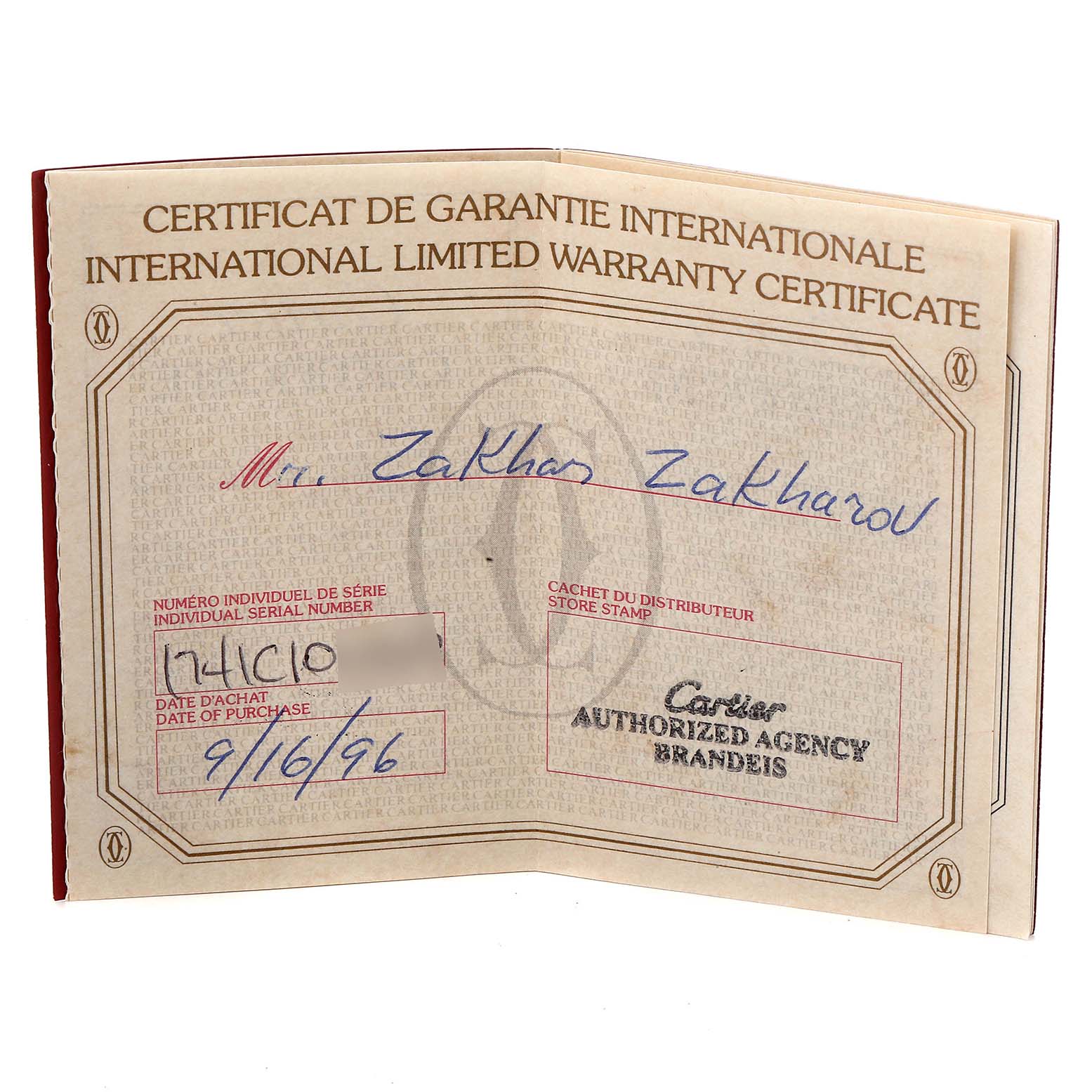 This image shows the international warranty certificate for a Cartier Tank Américaine watch.