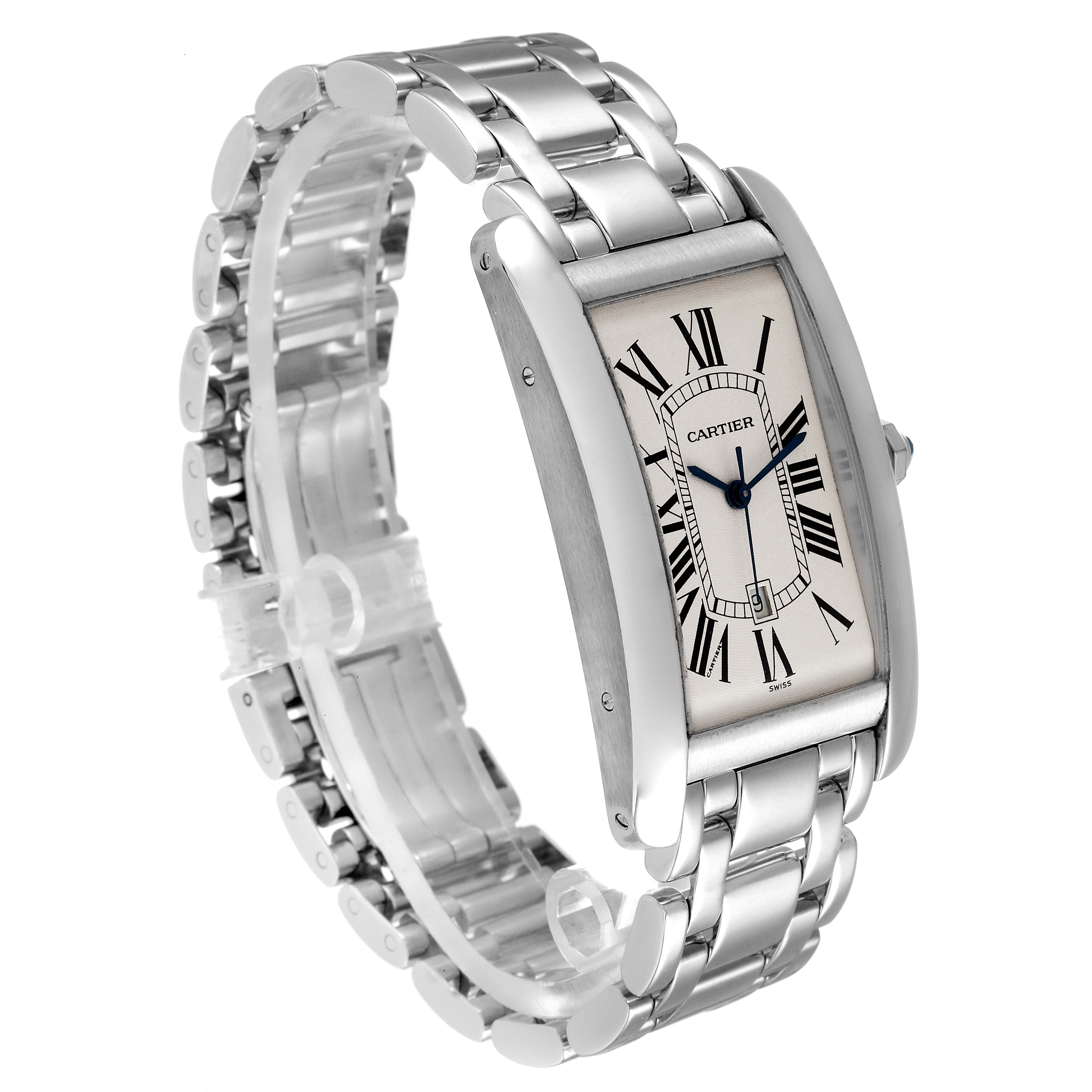 The Cartier Tank Americaine W26032L1 Men's White Gold Silver Dial W26032L1 Men's White Gold Silver Dial watch is shown at an angled view, highlighting its face, roman numerals, hands, case, and metal bracelet.