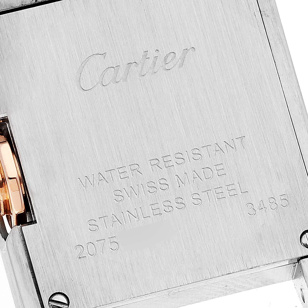 This image shows the case back of a Cartier Tank Anglaise W5310036 Women
s Steel and Gold (two tone) Silver Dial W5310036 Women
s Steel and Gold (two tone) Silver Dial watch, displaying engraving details.