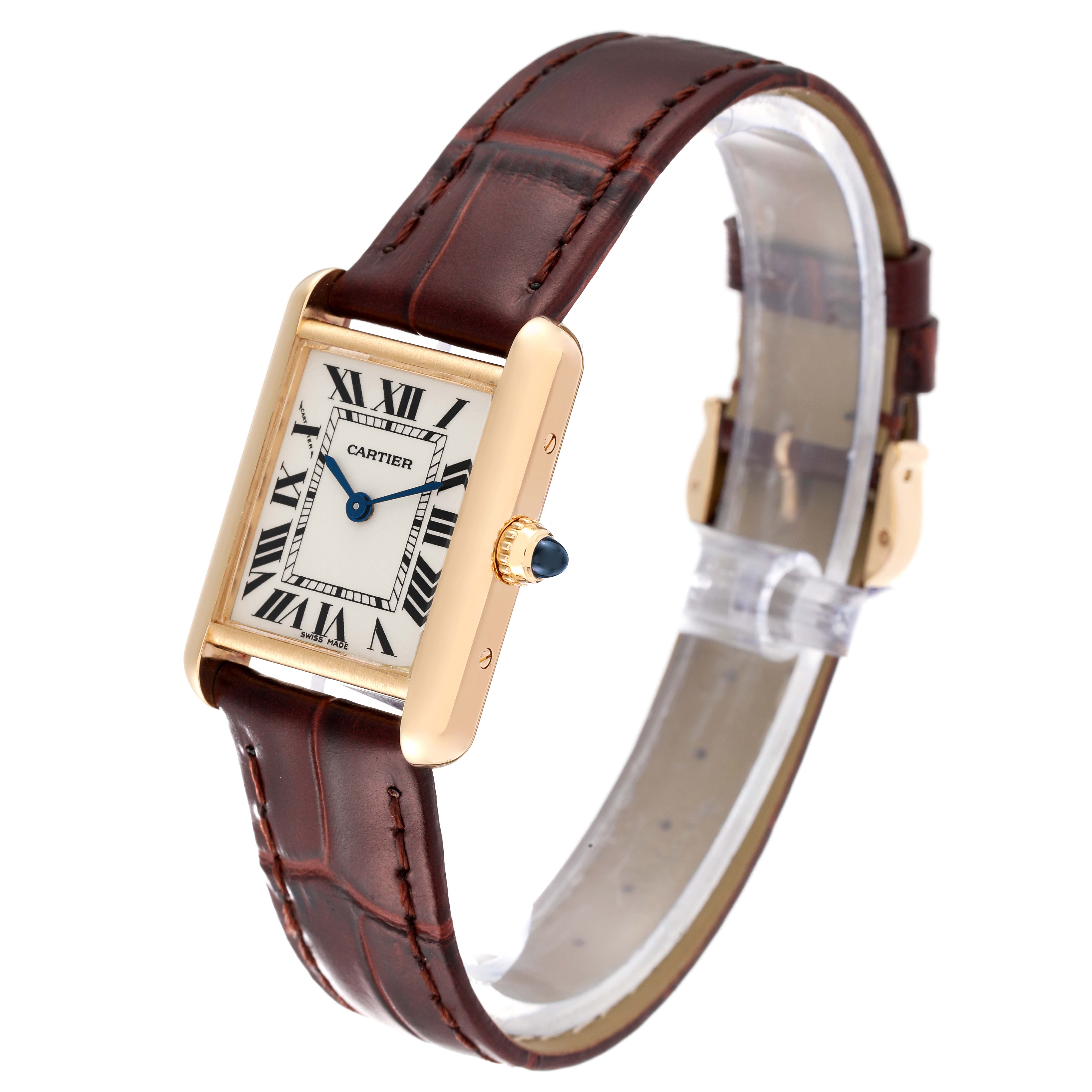 The Cartier Tank Louis W1529856 Women
s Yellow Gold Silver Dial W1529856 Women
s Yellow Gold Silver Dial watch is shown at an angle highlighting its rectangular face, Roman numerals, and brown leather strap.