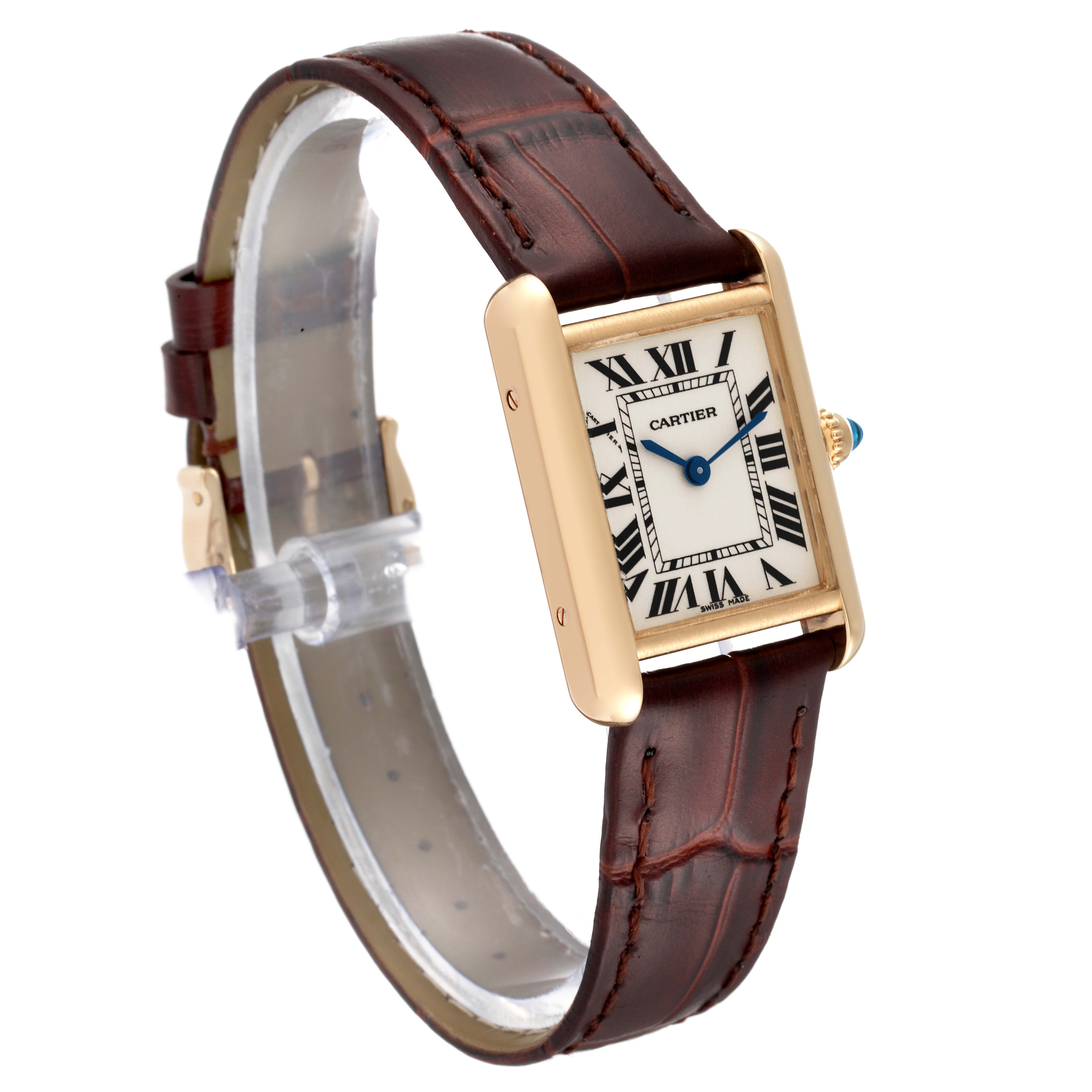 The image shows a Cartier Tank Louis W1529856 Women
s Yellow Gold Silver Dial W1529856 Women
s Yellow Gold Silver Dial watch angled to display its face, gold case, brown leather strap, and blue cabochon crown.