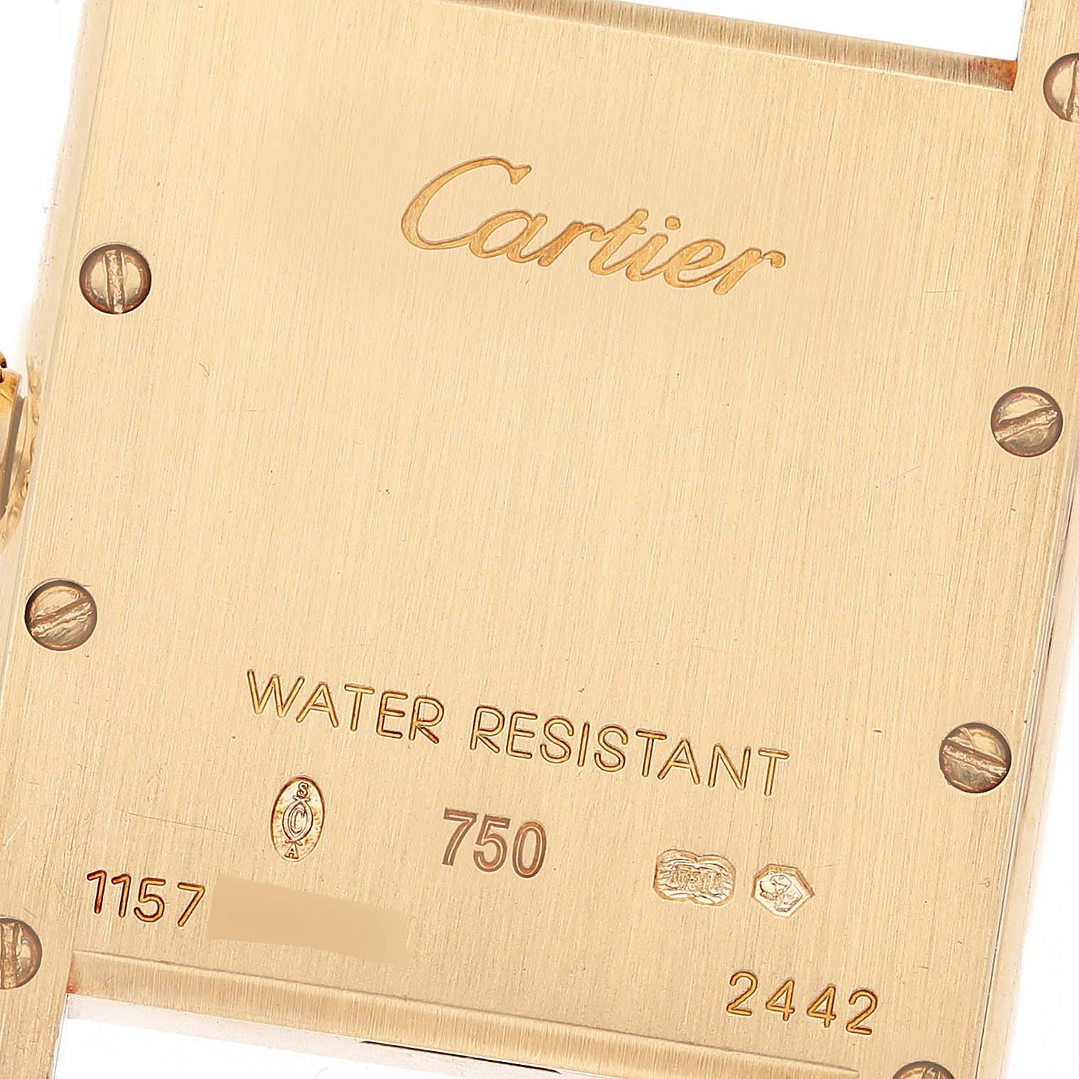 The image shows the back case of a Cartier Tank Louis W1529856 Women
s Yellow Gold Silver Dial W1529856 Women
s Yellow Gold Silver Dial model watch, highlighting its engraving details.