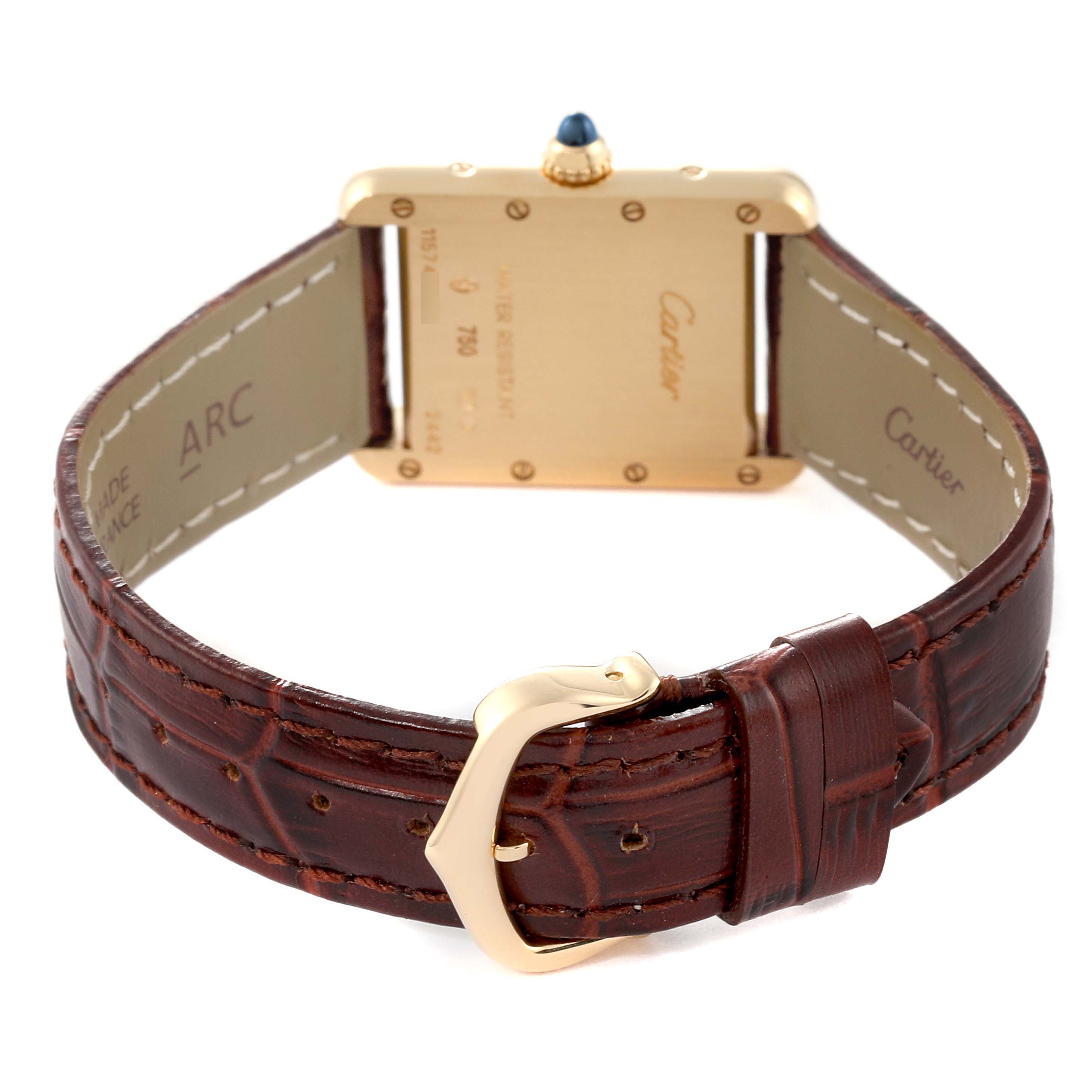 The image shows a rear view of the Cartier Tank Louis W1529856 Women
s Yellow Gold Silver Dial W1529856 Women
s Yellow Gold Silver Dial watch, highlighting its case back, crown, and leather strap with buckle.