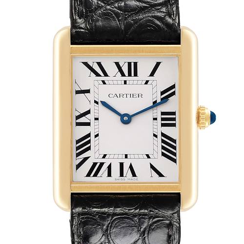 The Cartier Tank Solo watch is shown from the front, highlighting its face, hands, Roman numerals, and gold case.